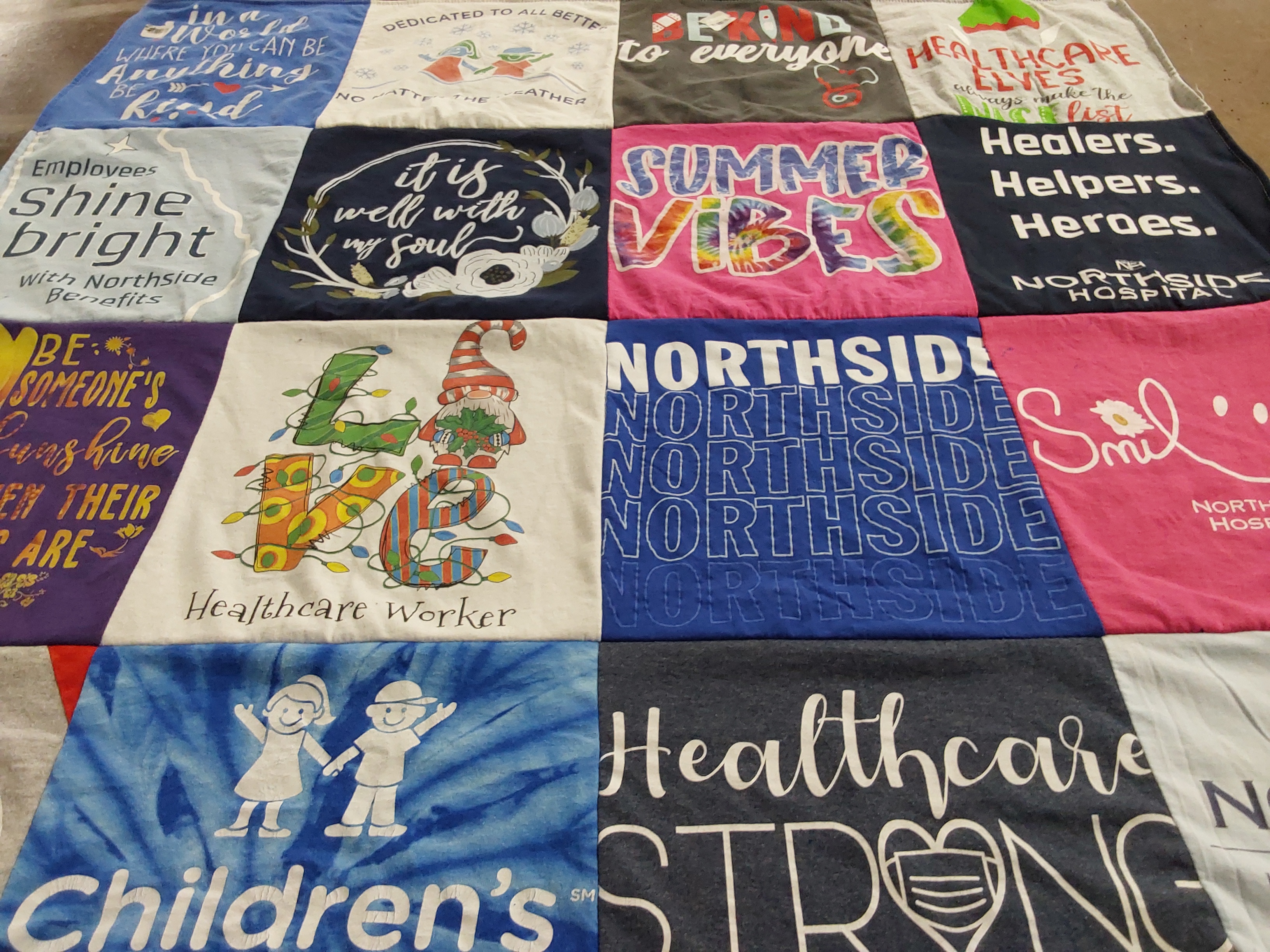 T-shirt quilt with healthcare, community service themes by Hope from GA
