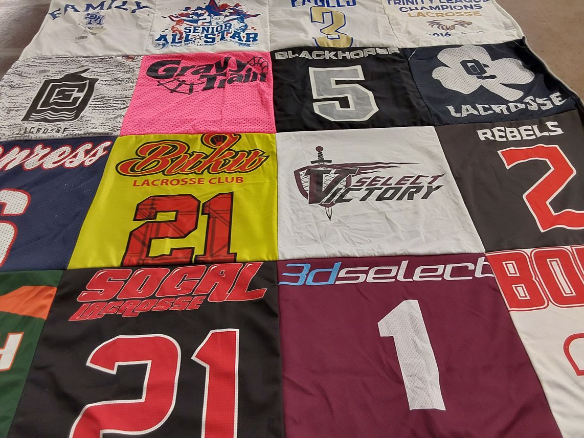 T-shirt quilt with lacrosse themes by Robin from TX