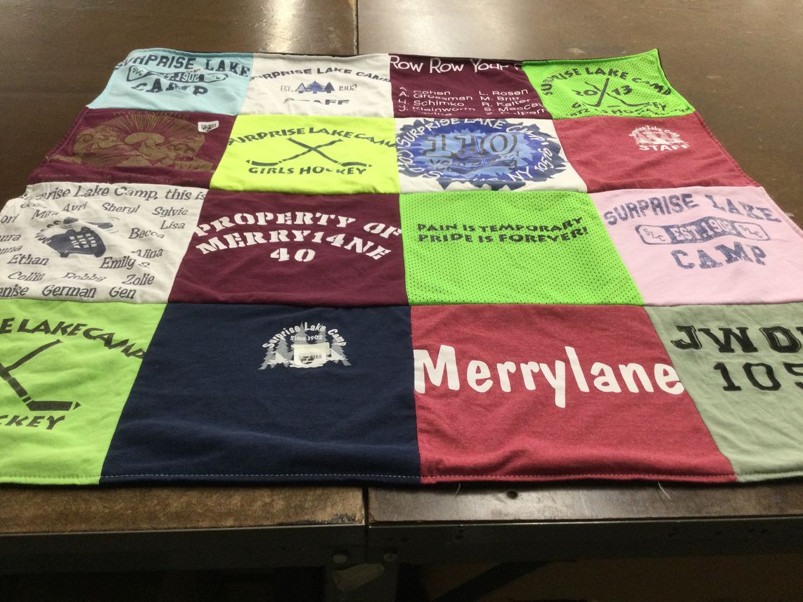 T-shirt quilt with camping, hockey themes by Jordan from NY