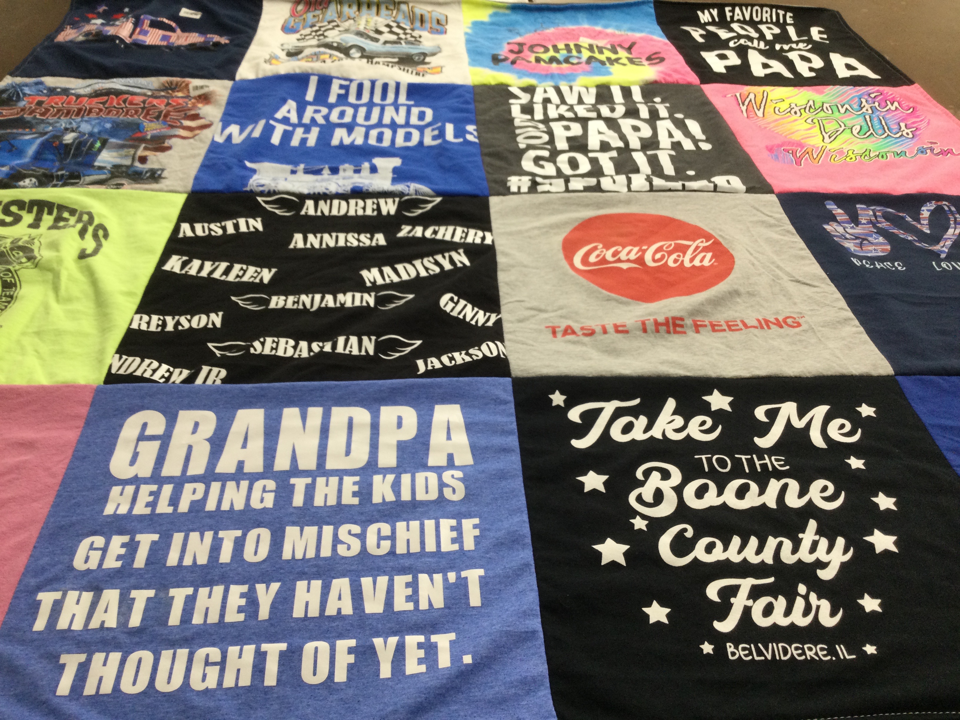 T-shirt quilt with family, food themes by Kathy from IL