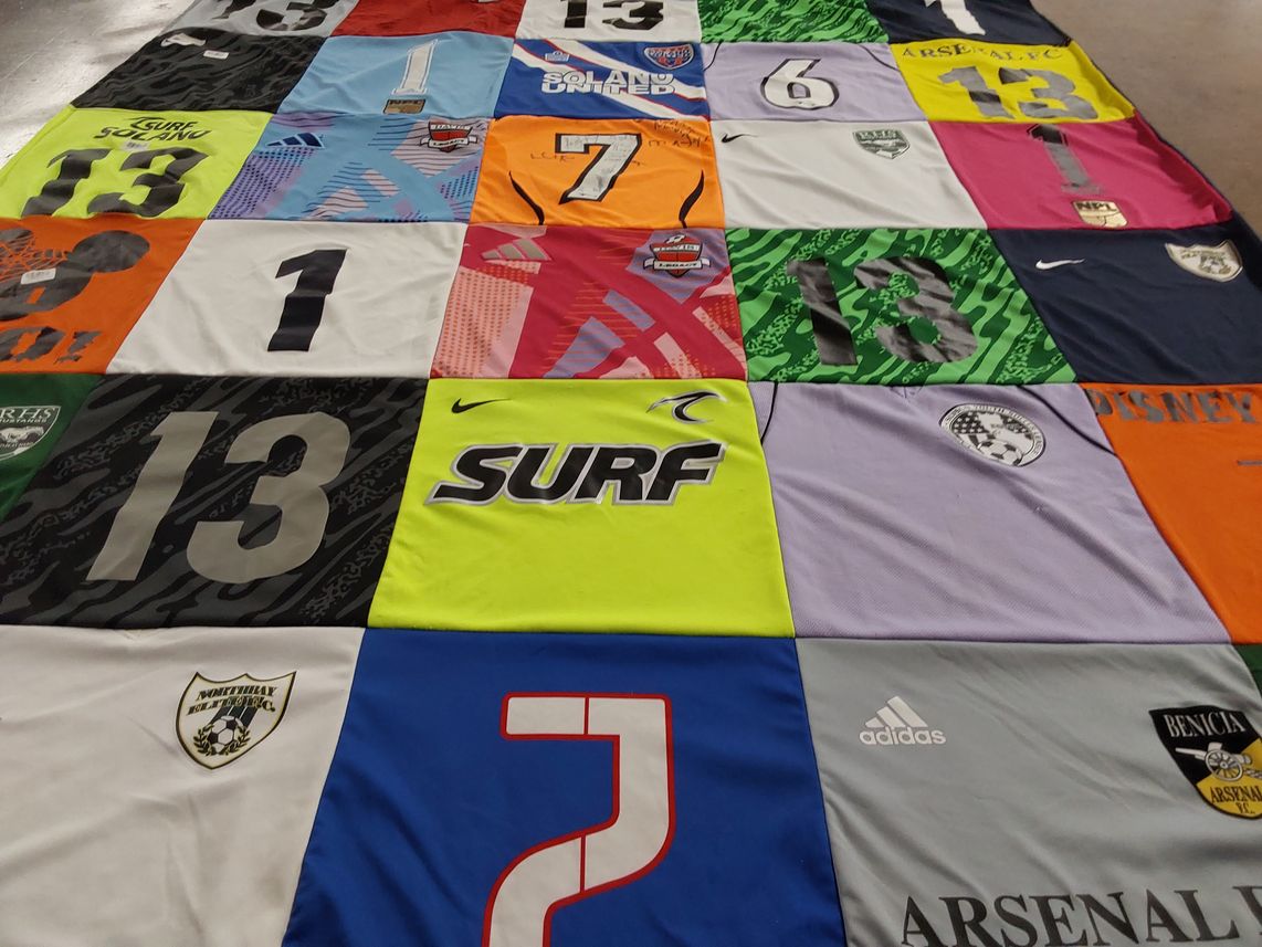 T-shirt quilt featuring arsenal football club by Jennifer from CA