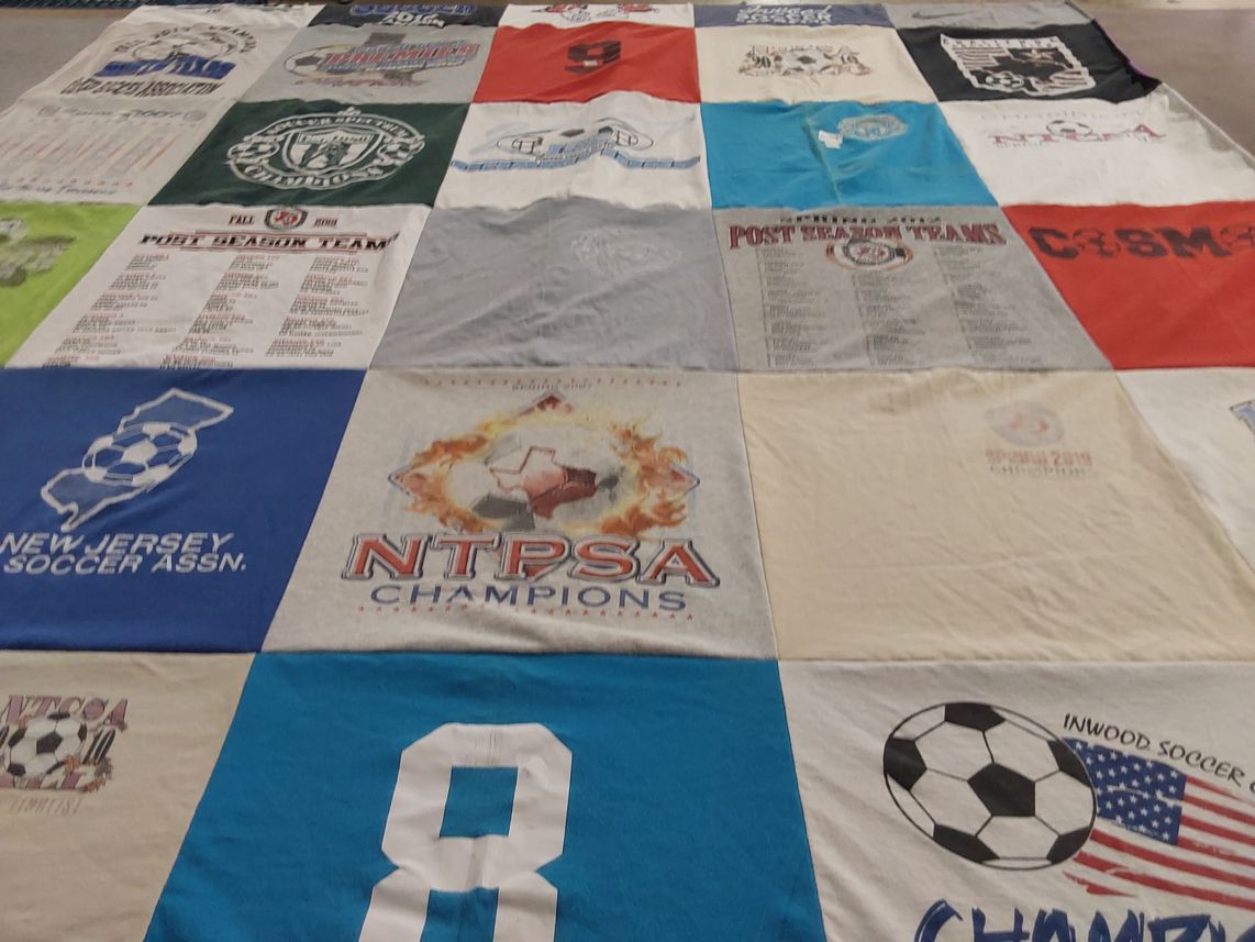 T-shirt quilt with soccer themes by Kelly from TX