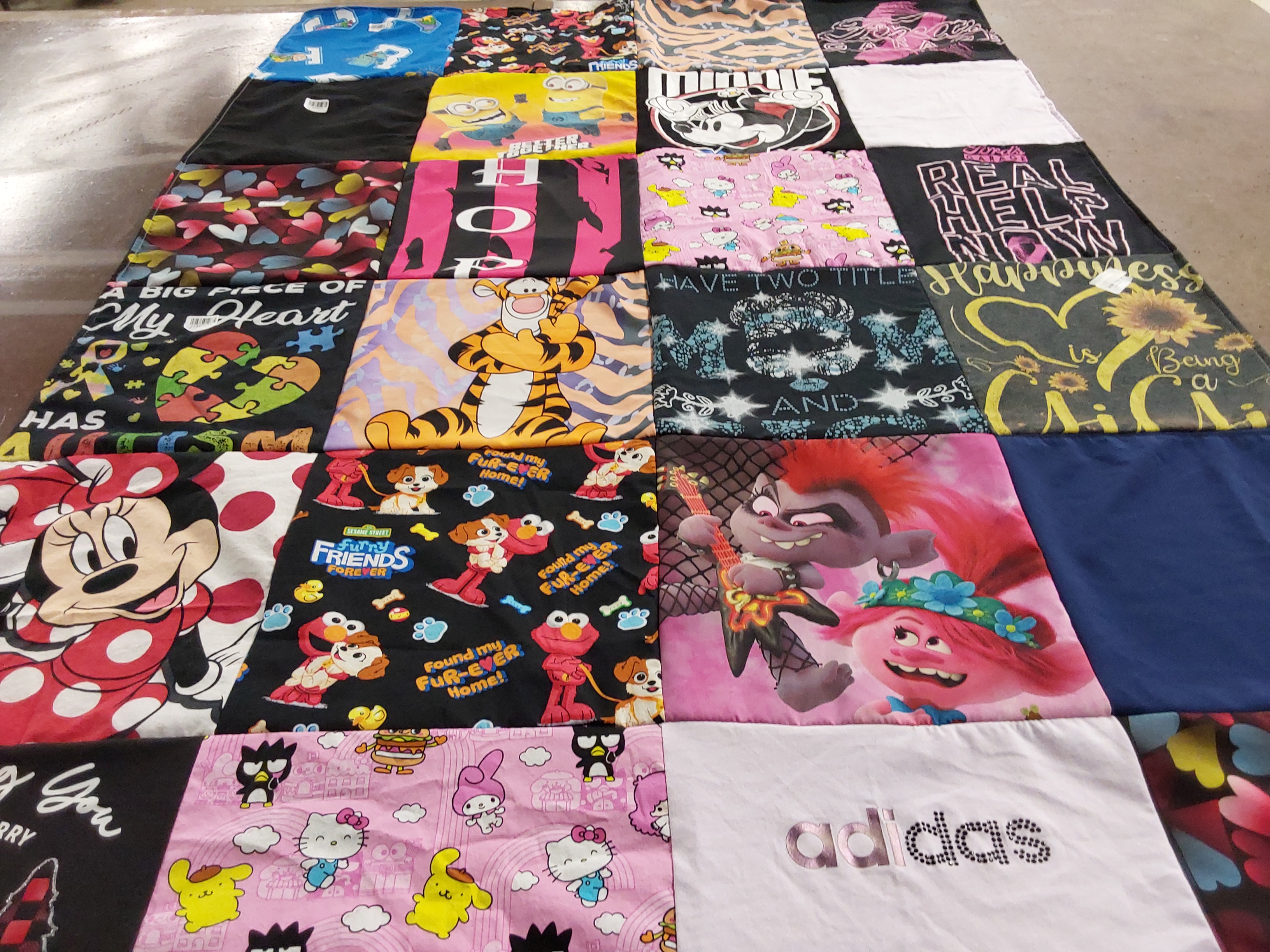 T-shirt quilt with cartoons, disney themes by Angela from MI
