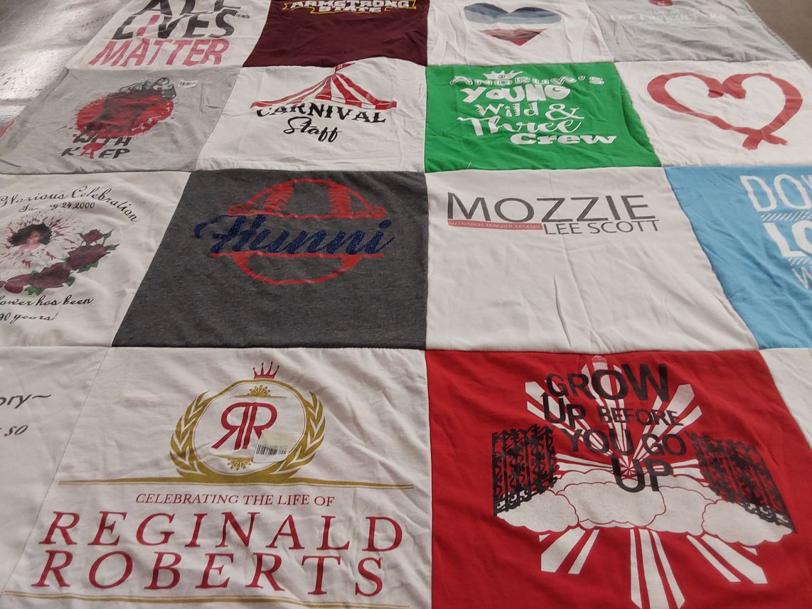 T-shirt quilt with celebration, community themes by KIMBERLY from FL