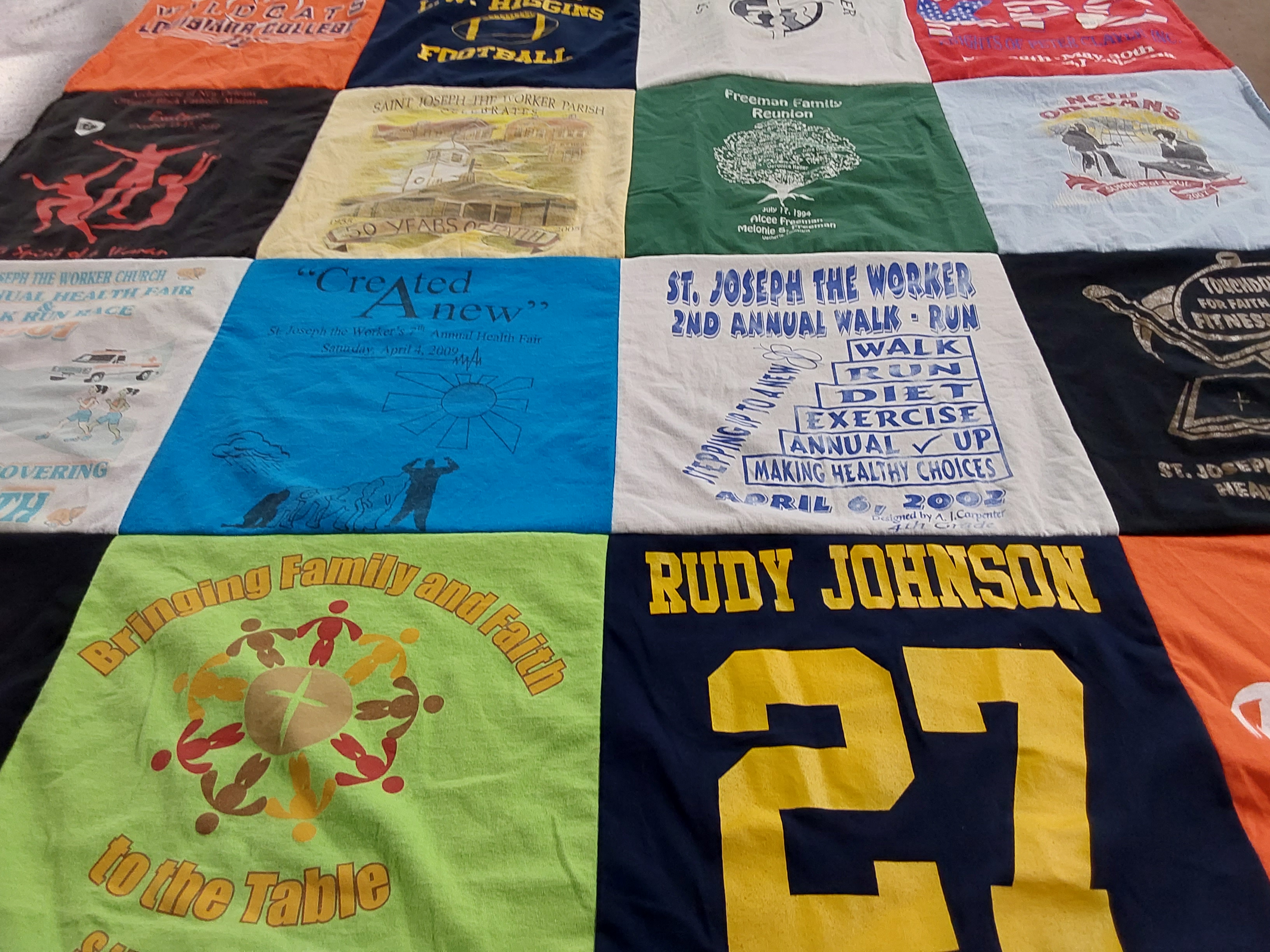 T-shirt quilt with health, fitness themes by Eva from LA