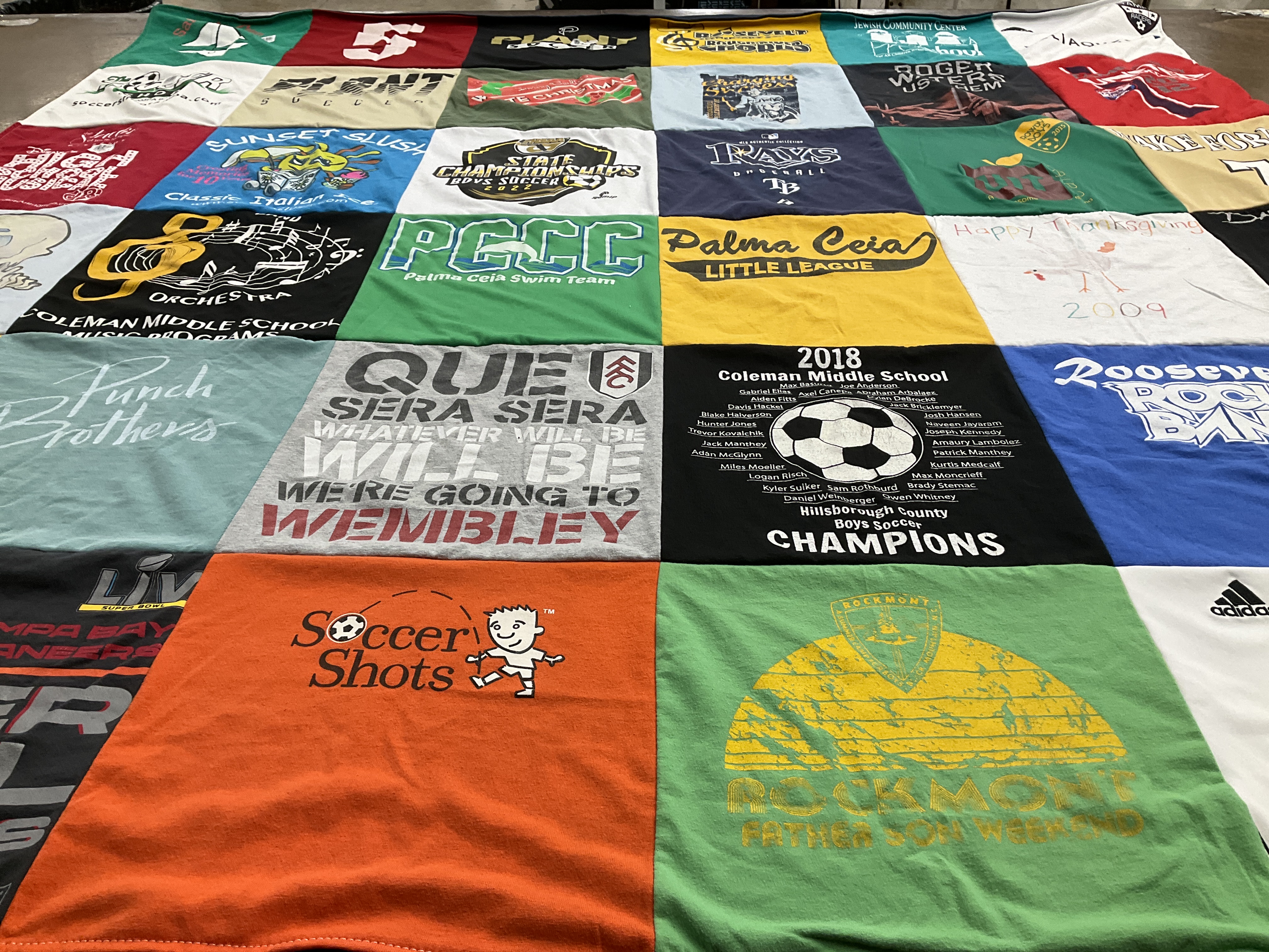 Custom Project Repat t-shirt quilt featuring shirts from coleman middle school.
