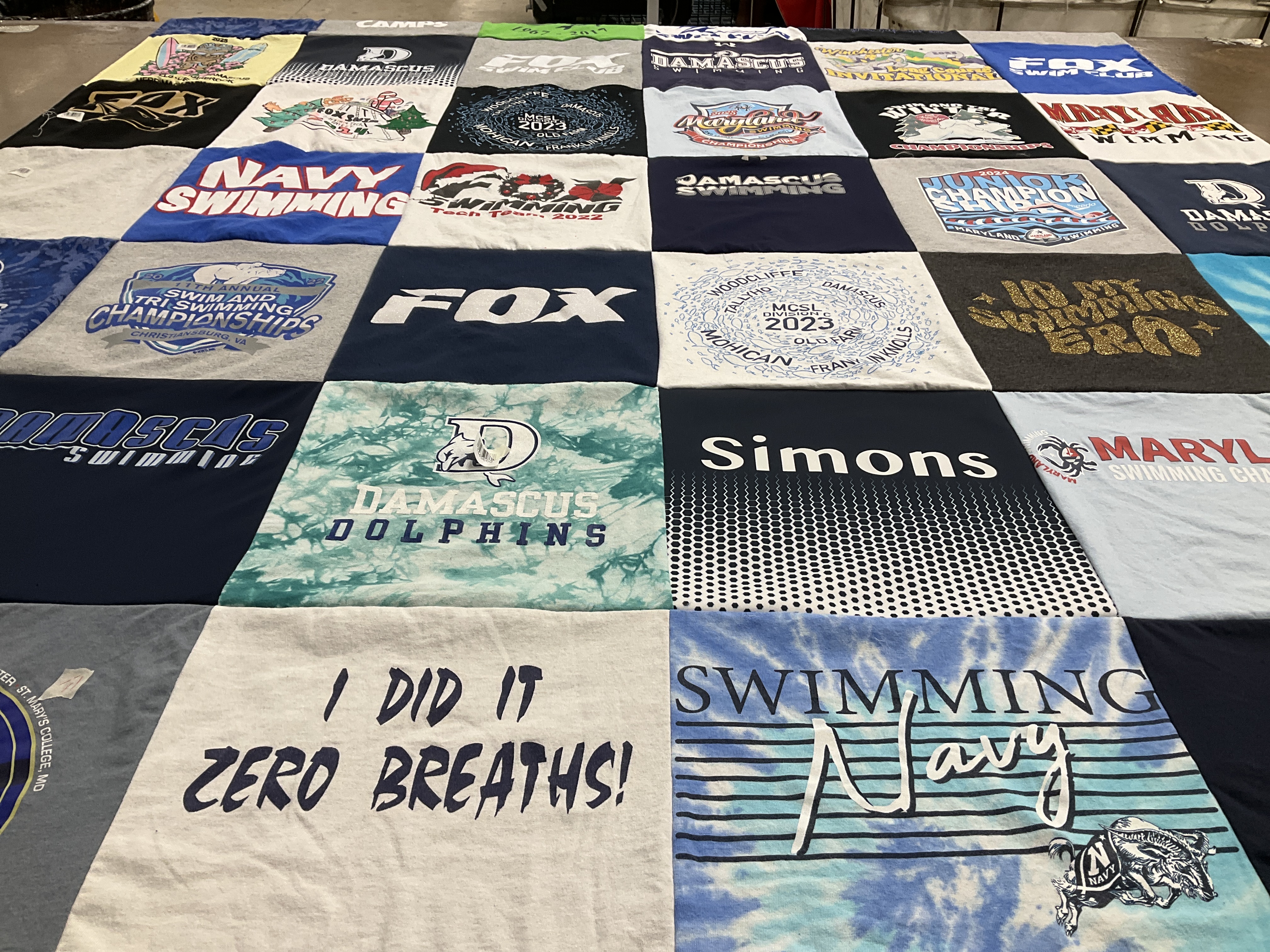 Custom Project Repat t-shirt quilt featuring shirts from damascus high school, maryland university.