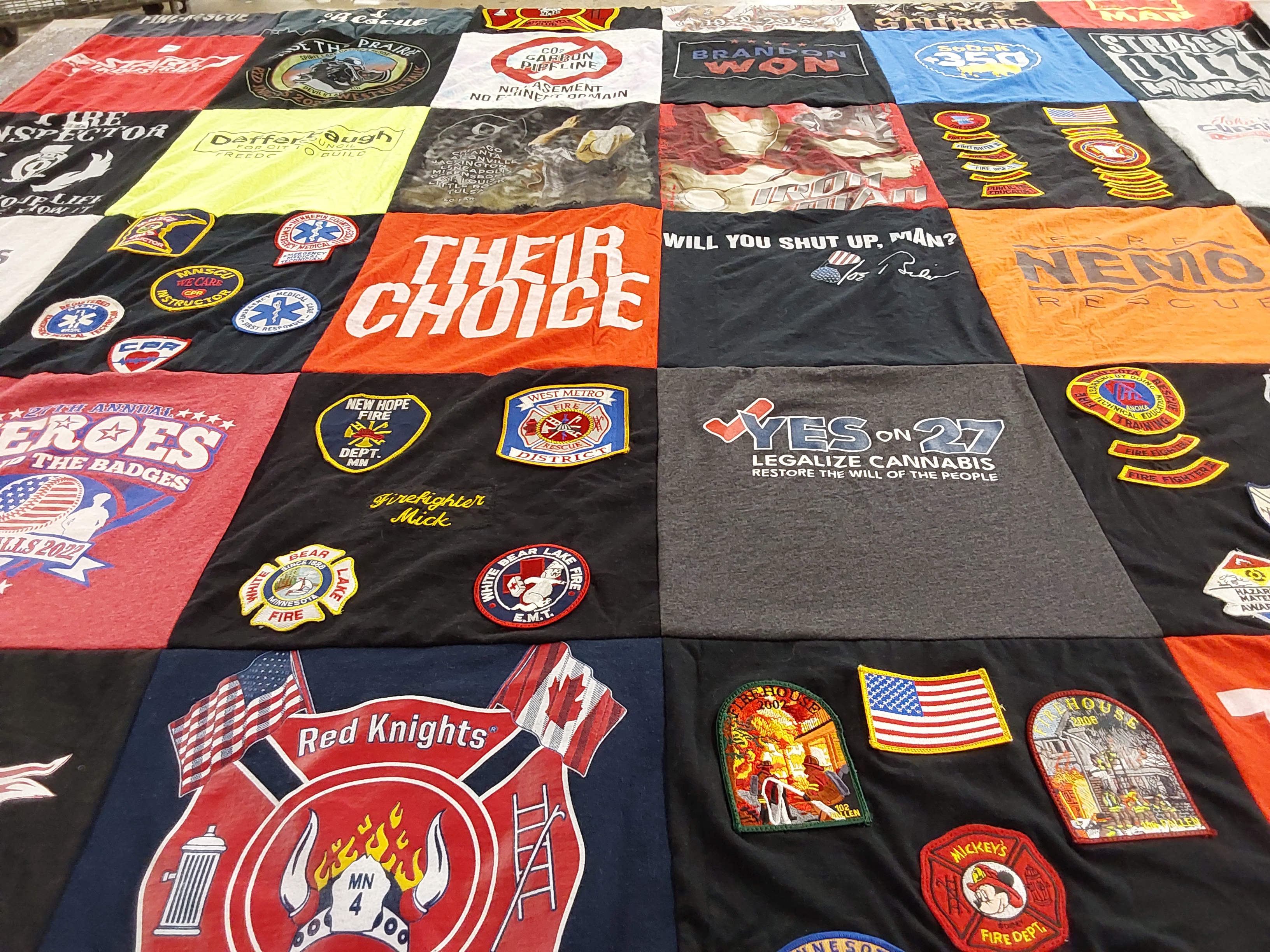 T-shirt quilt with firefighting, politics themes by Mick from SD