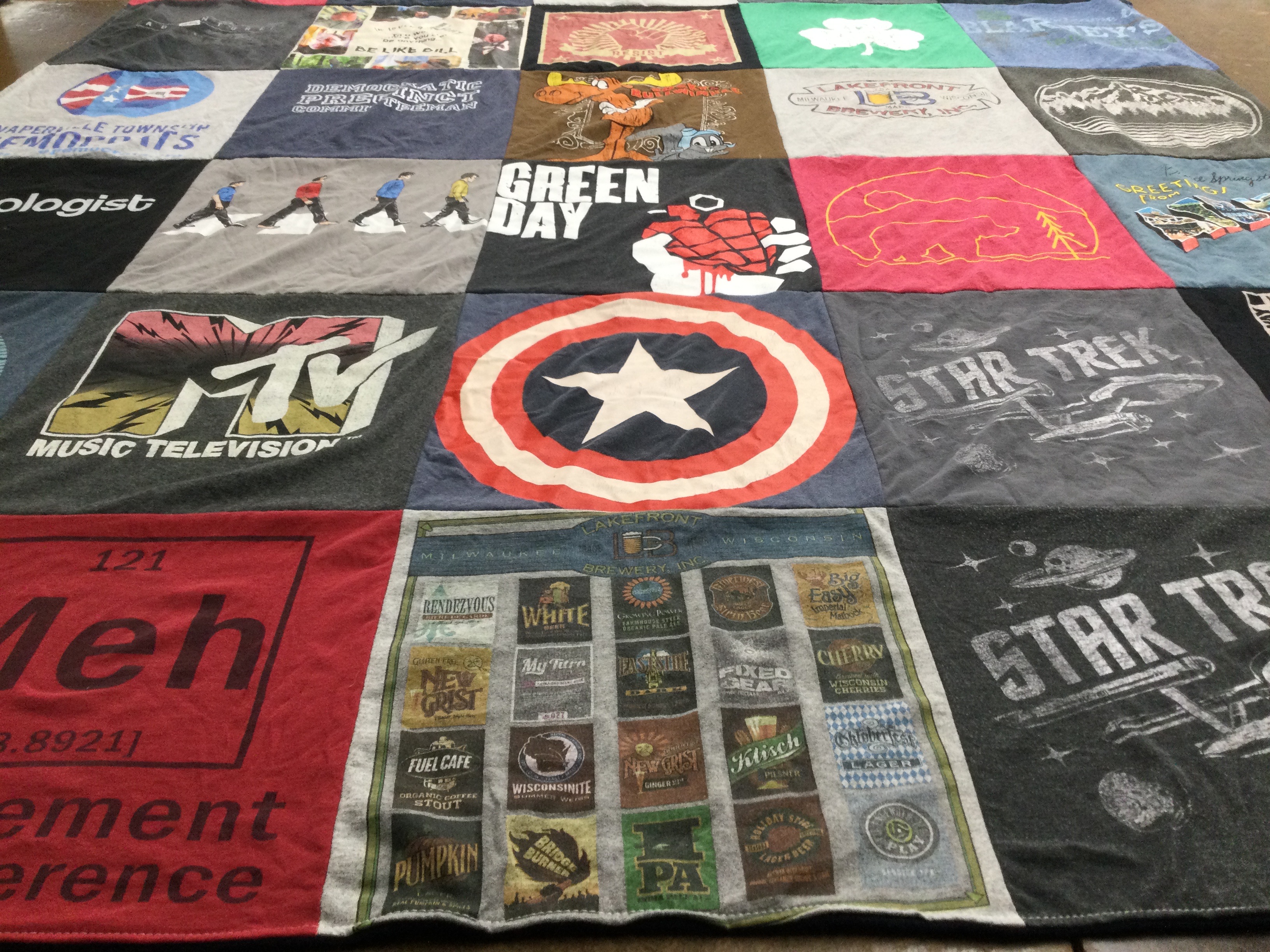 T-shirt quilt with music, television themes by Cathleen from IL