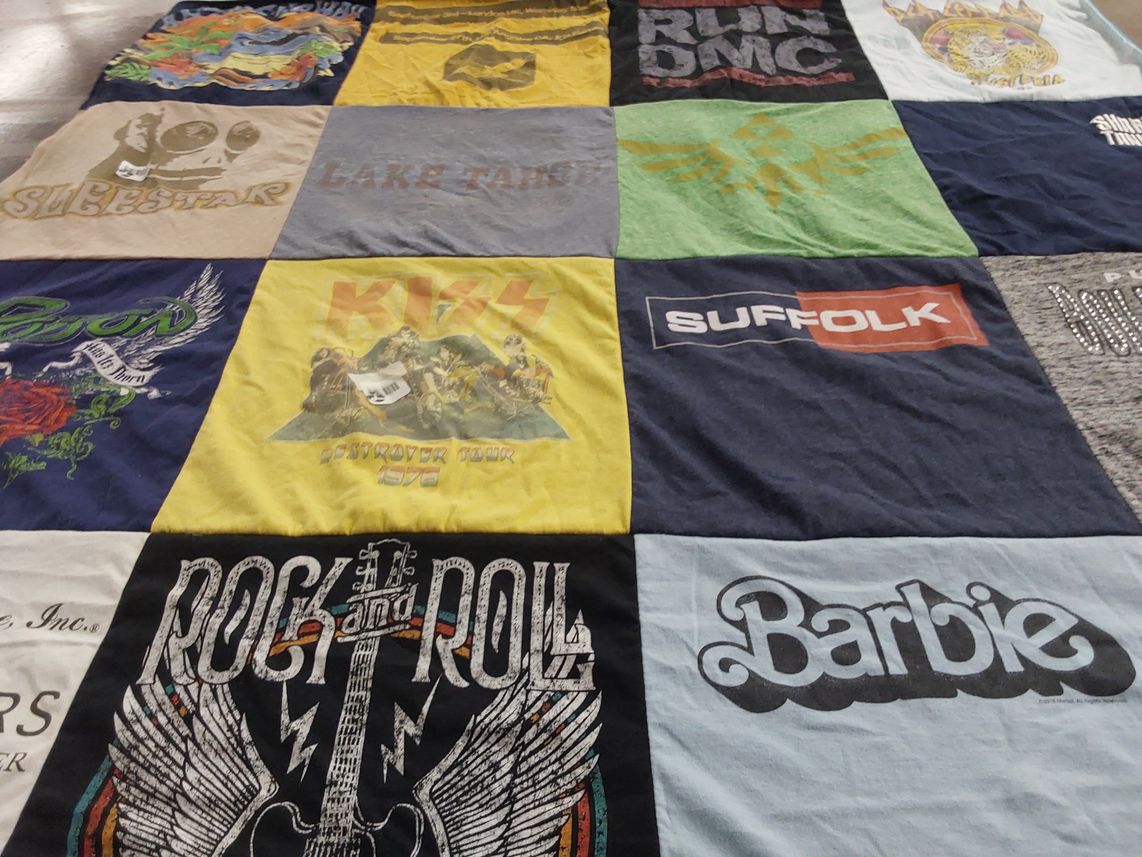 T-shirt quilt with music, pop culture themes by Stacey from CA