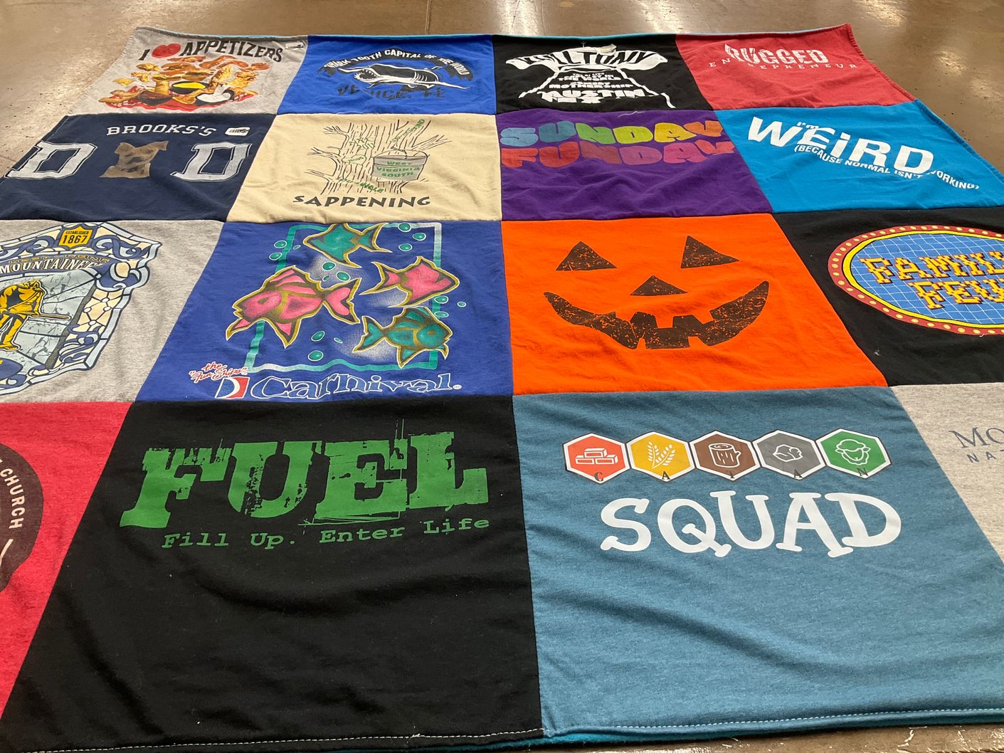 T-shirt quilt with fishing, halloween themes by Kelly from WV
