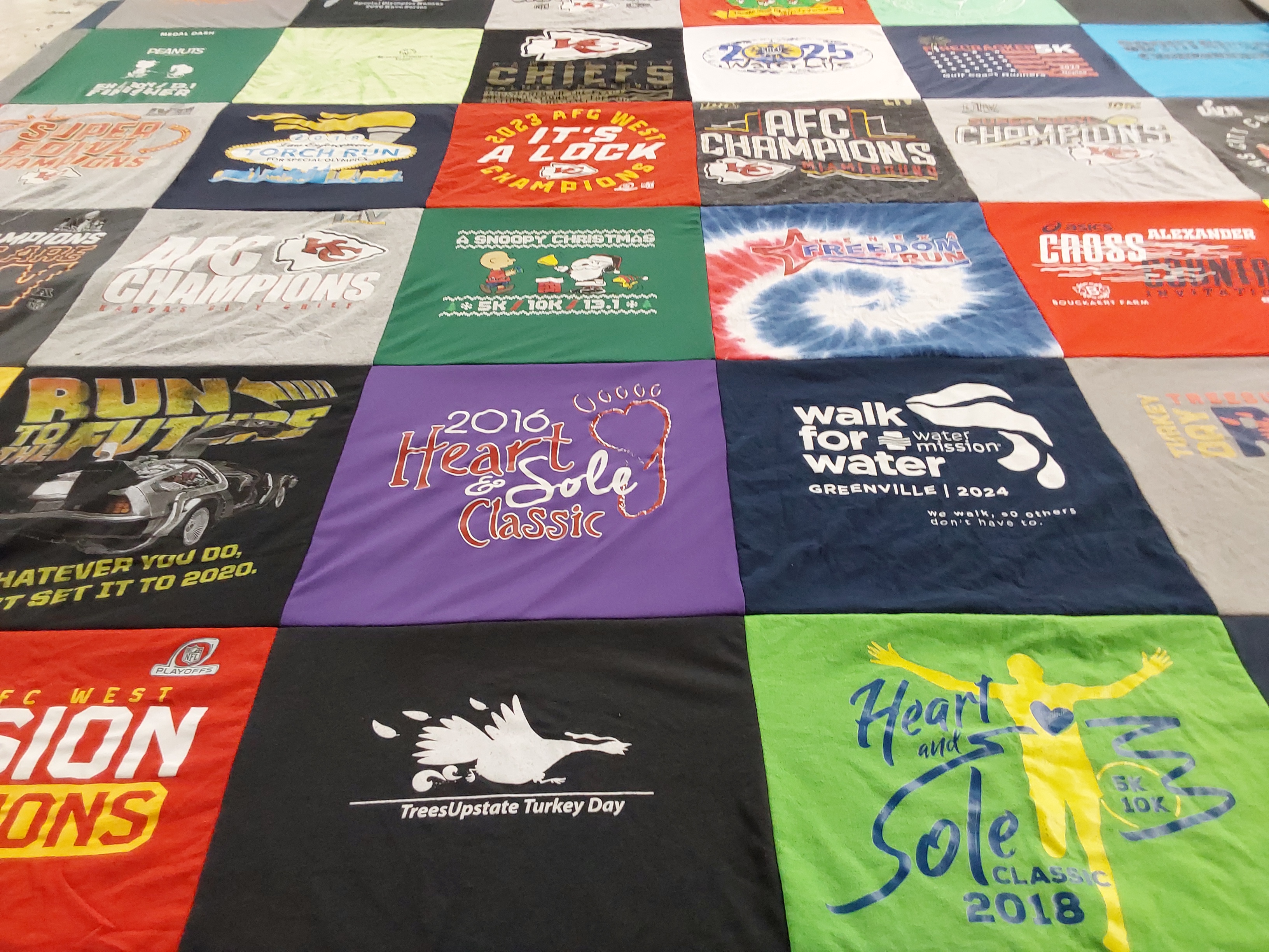 T-shirt quilt with sports, running themes by Gary from SC