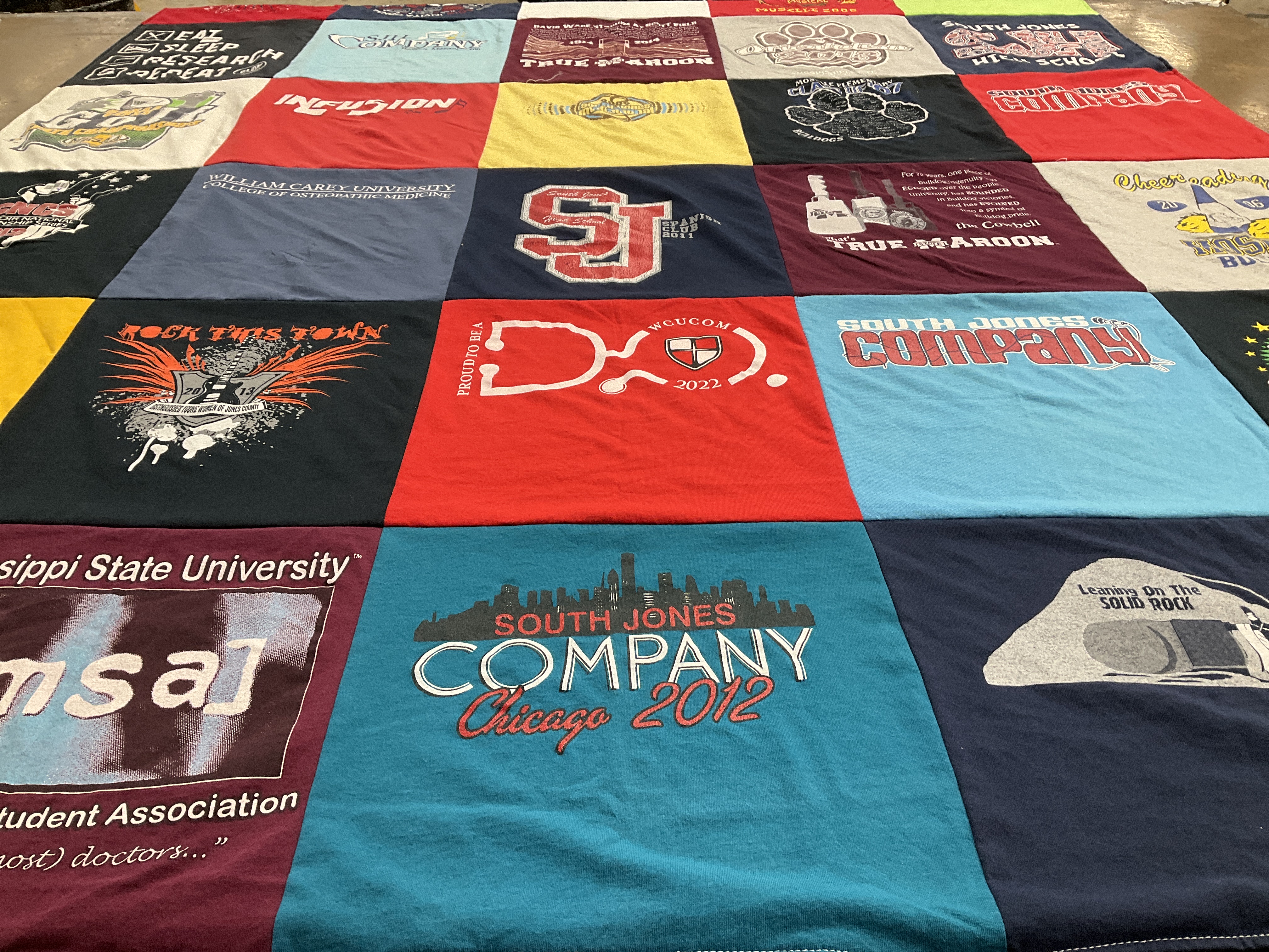 Custom Project Repat t-shirt quilt featuring shirts from mississippi state university, william carey university.