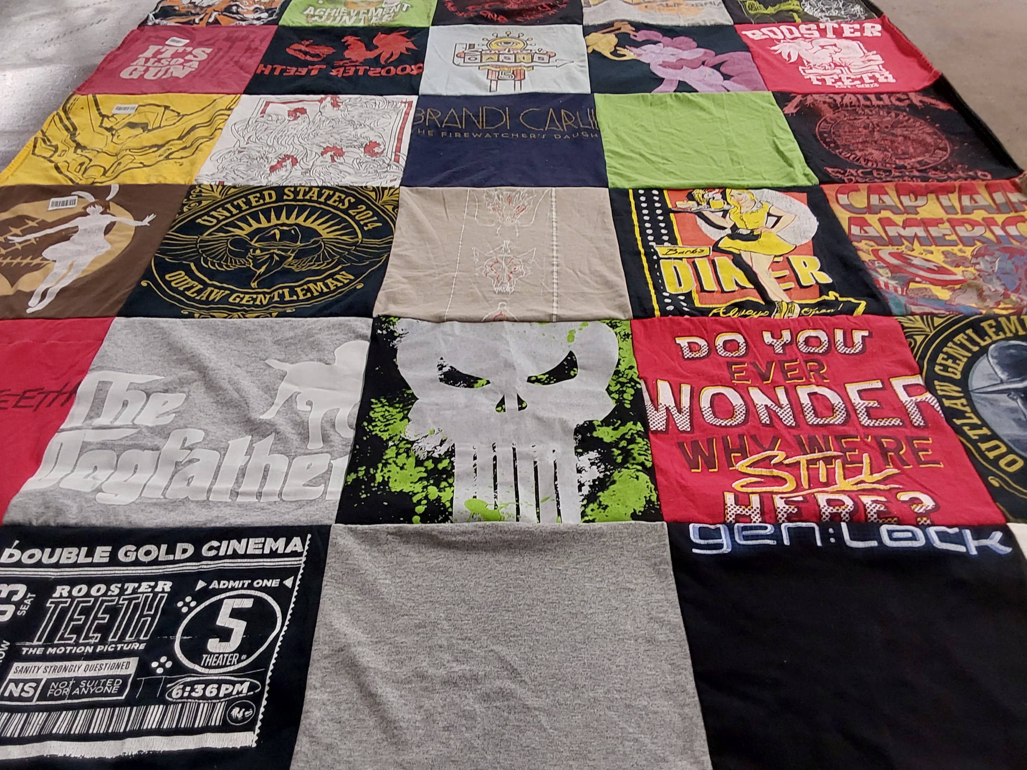T-shirt quilt with movies, music themes by Roxanne from NV