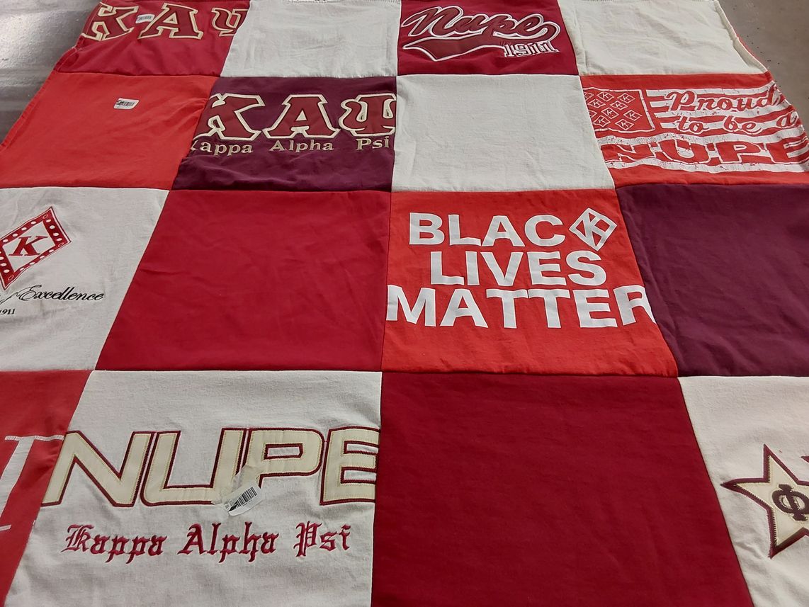 T-shirt quilt with fraternities, social justice themes by Mrs. Sheila Y. from GA