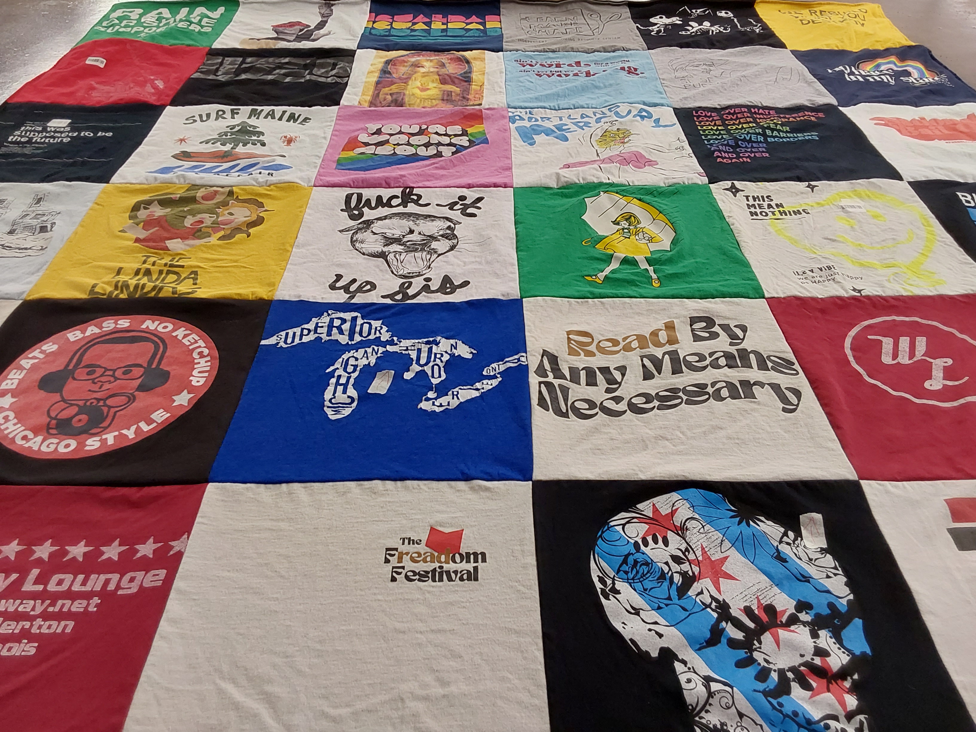 T-shirt quilt with music, reading themes by Ann from OR