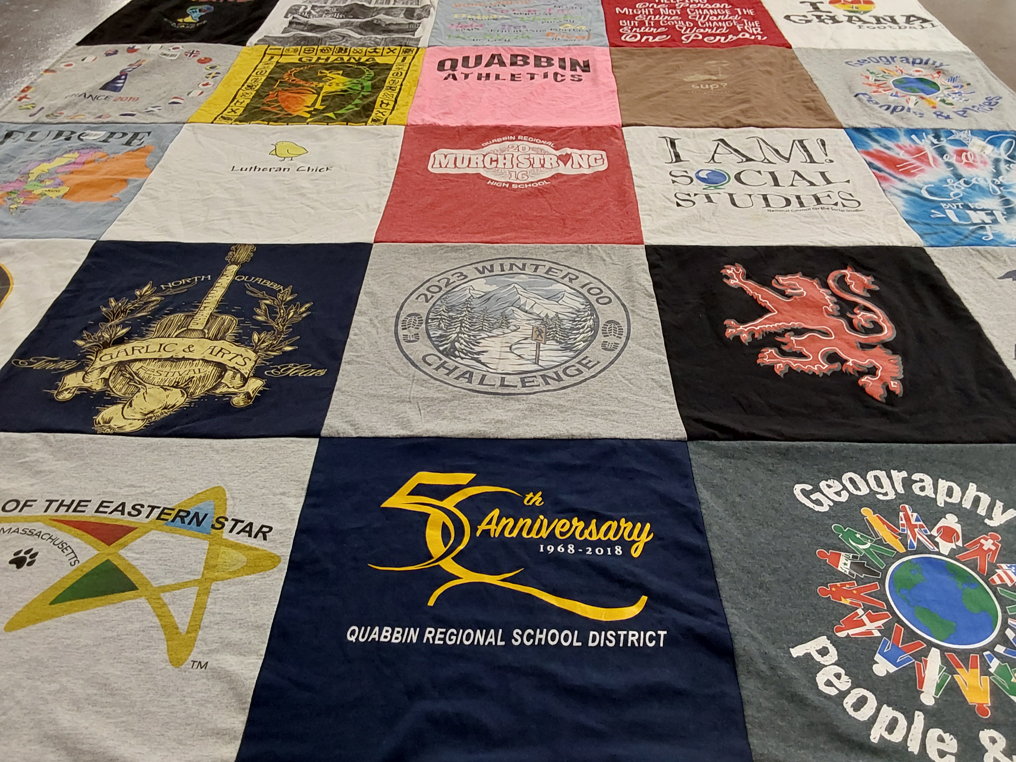 Custom Project Repat t-shirt quilt featuring shirts from quabbin regional school district.