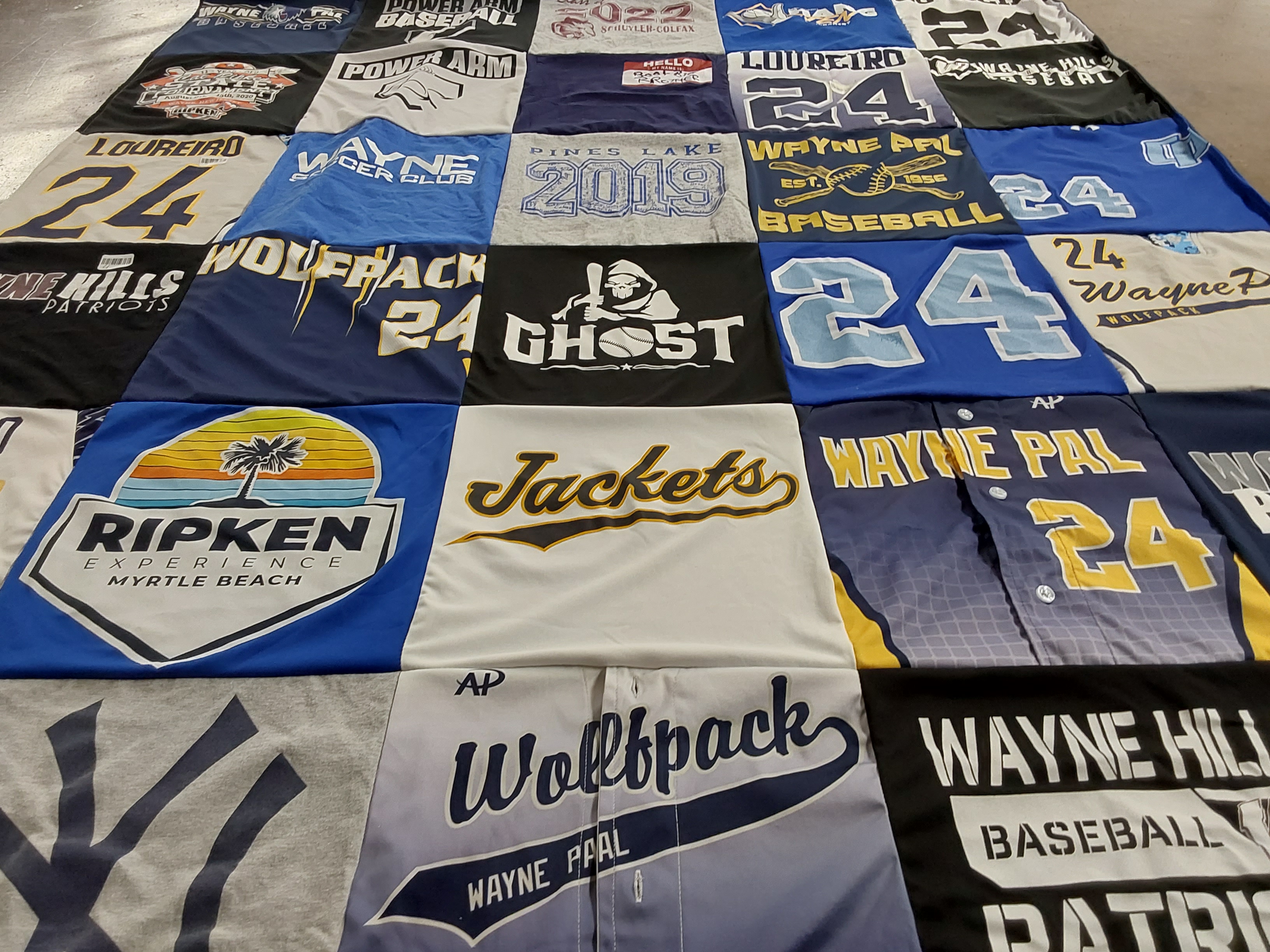 T-shirt quilt featuring wolfpack, jackets by Tina from NJ