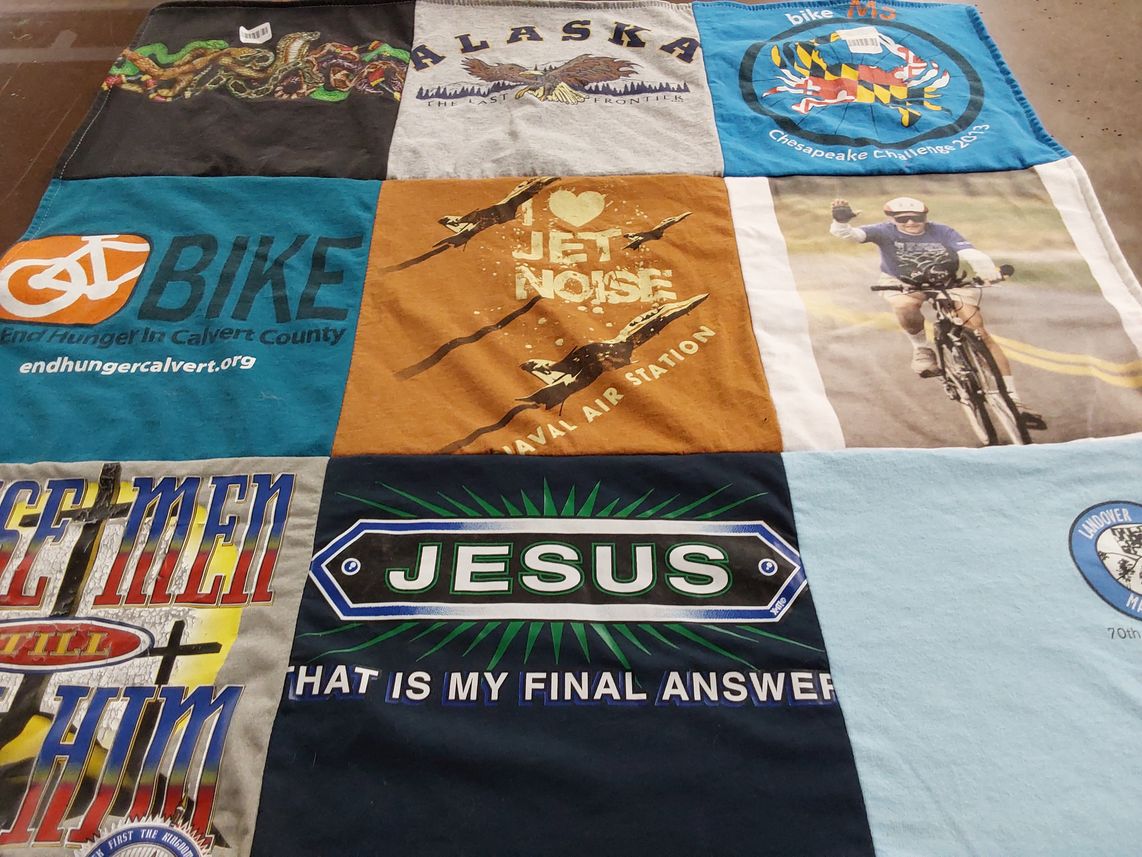 T-shirt quilt with cycling, charity themes by Linda from MD