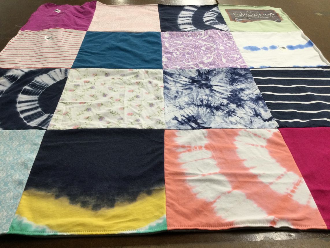 T-shirt quilt with education themes by Clark from TX