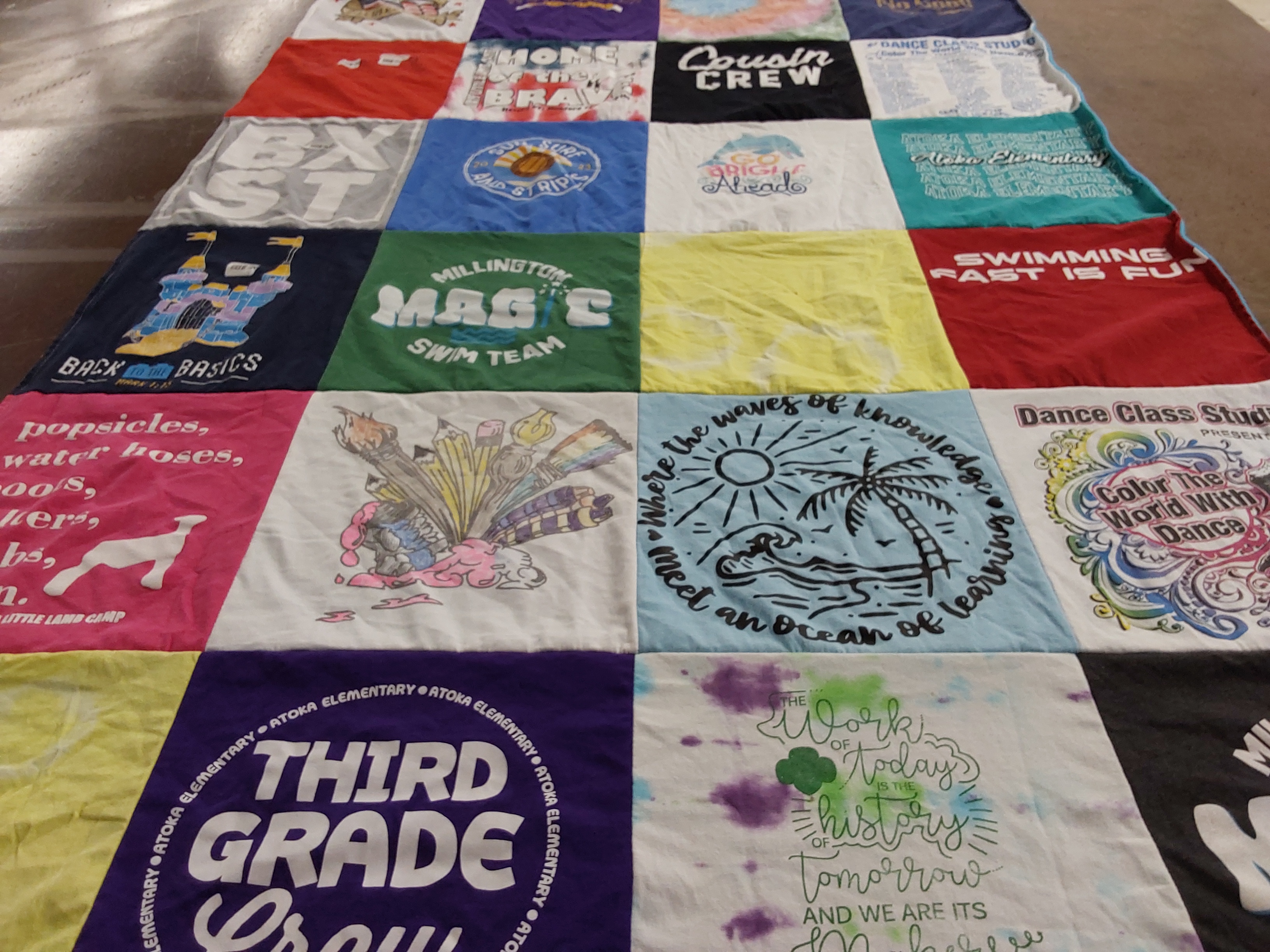 T-shirt quilt featuring millington magic swim team by Paul from TN