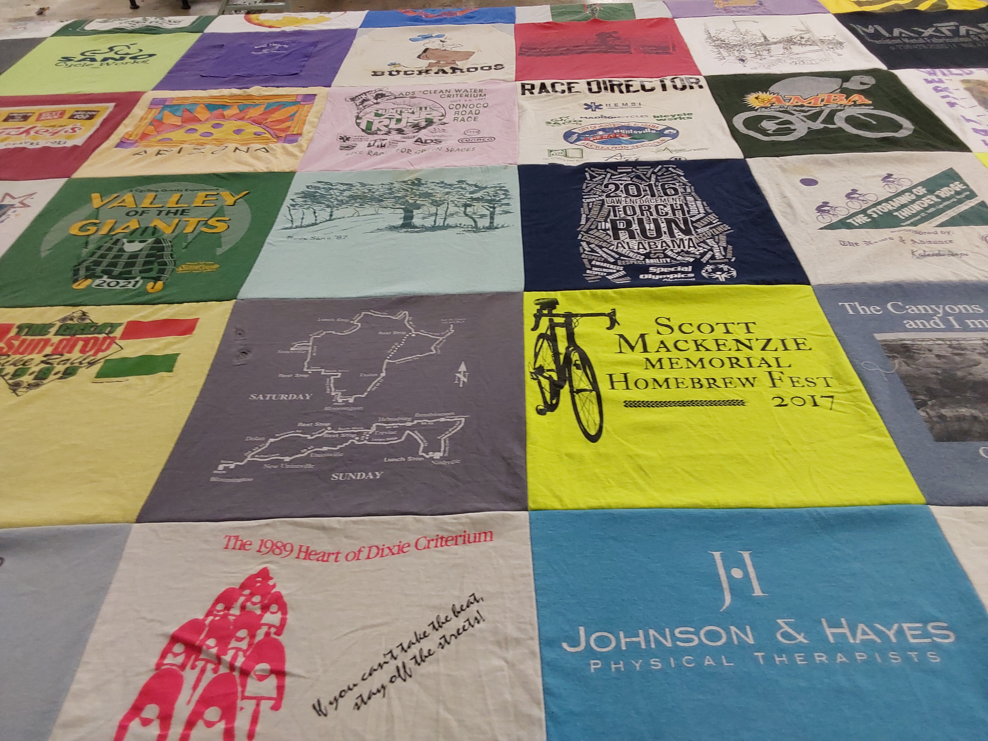T-shirt quilt with cycling, homebrewing themes by Jacqy from AL