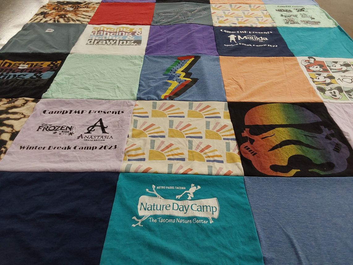 T-shirt quilt with theater, nature themes by Jennifer from WA