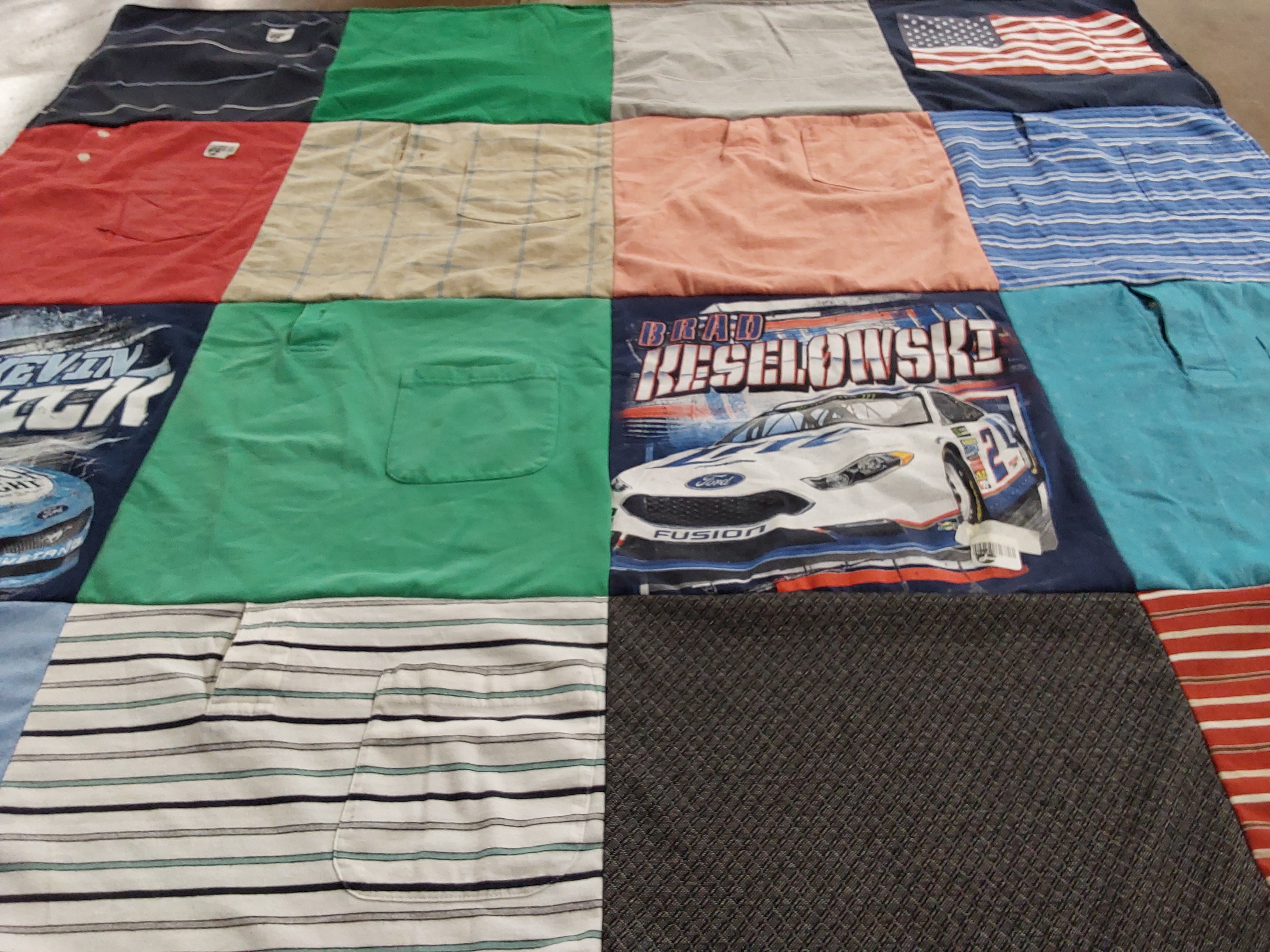 T-shirt quilt with racing themes by Patti from OH