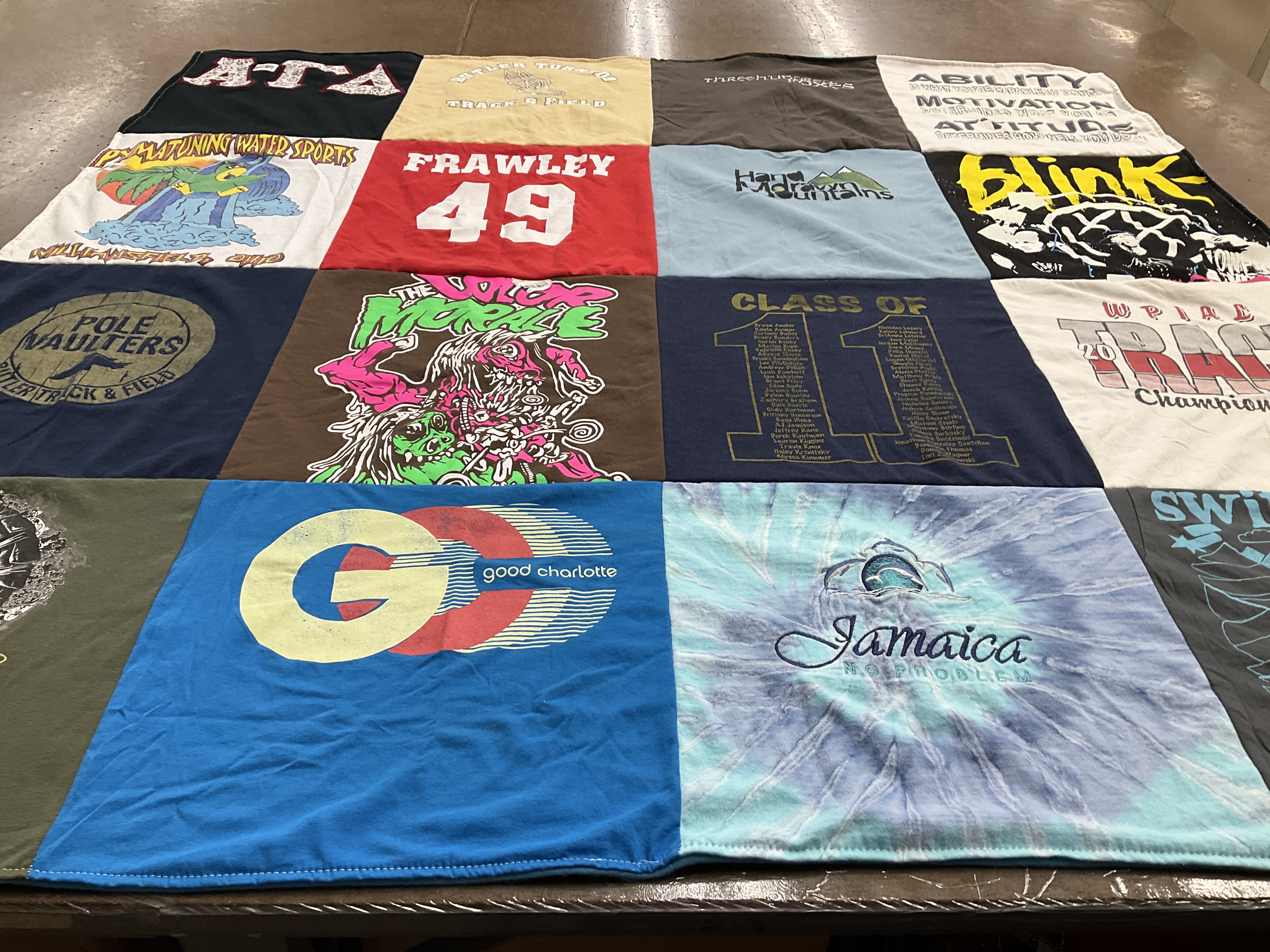 T-shirt quilt featuring swimming team, track and field team by Sue from PA