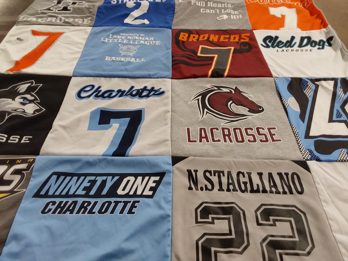 T-shirt quilt with lacrosse, baseball themes by Elizabeth from NC