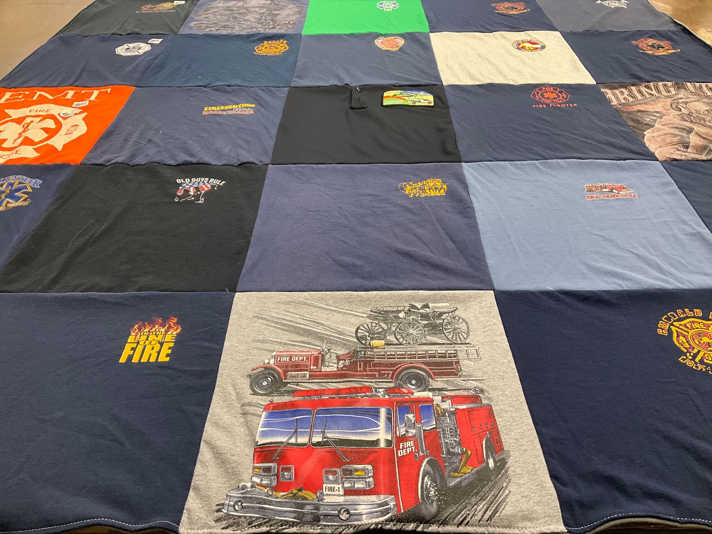 T-shirt quilt with firefighting, emergency services themes by Carmin from IN