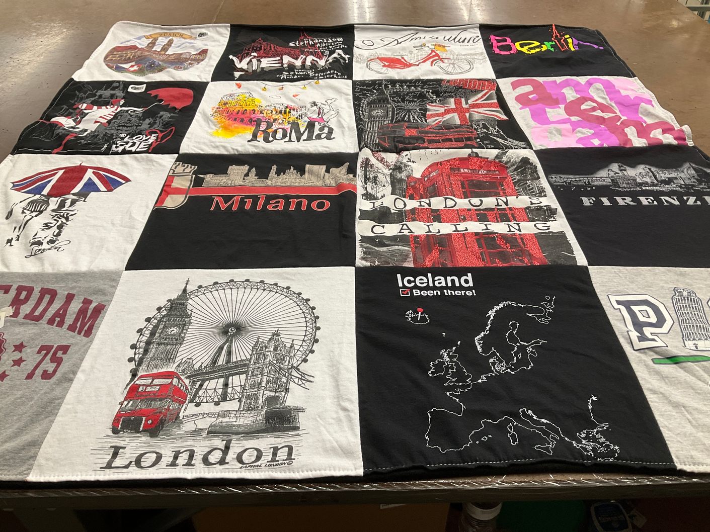 T-shirt quilt with travel, tourism themes by Nina from FL