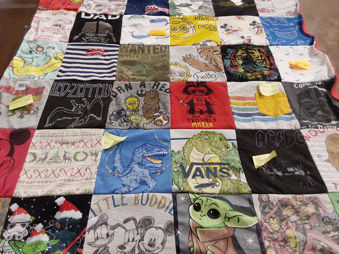 T-shirt quilt with star wars, music themes by Rebecca from CA