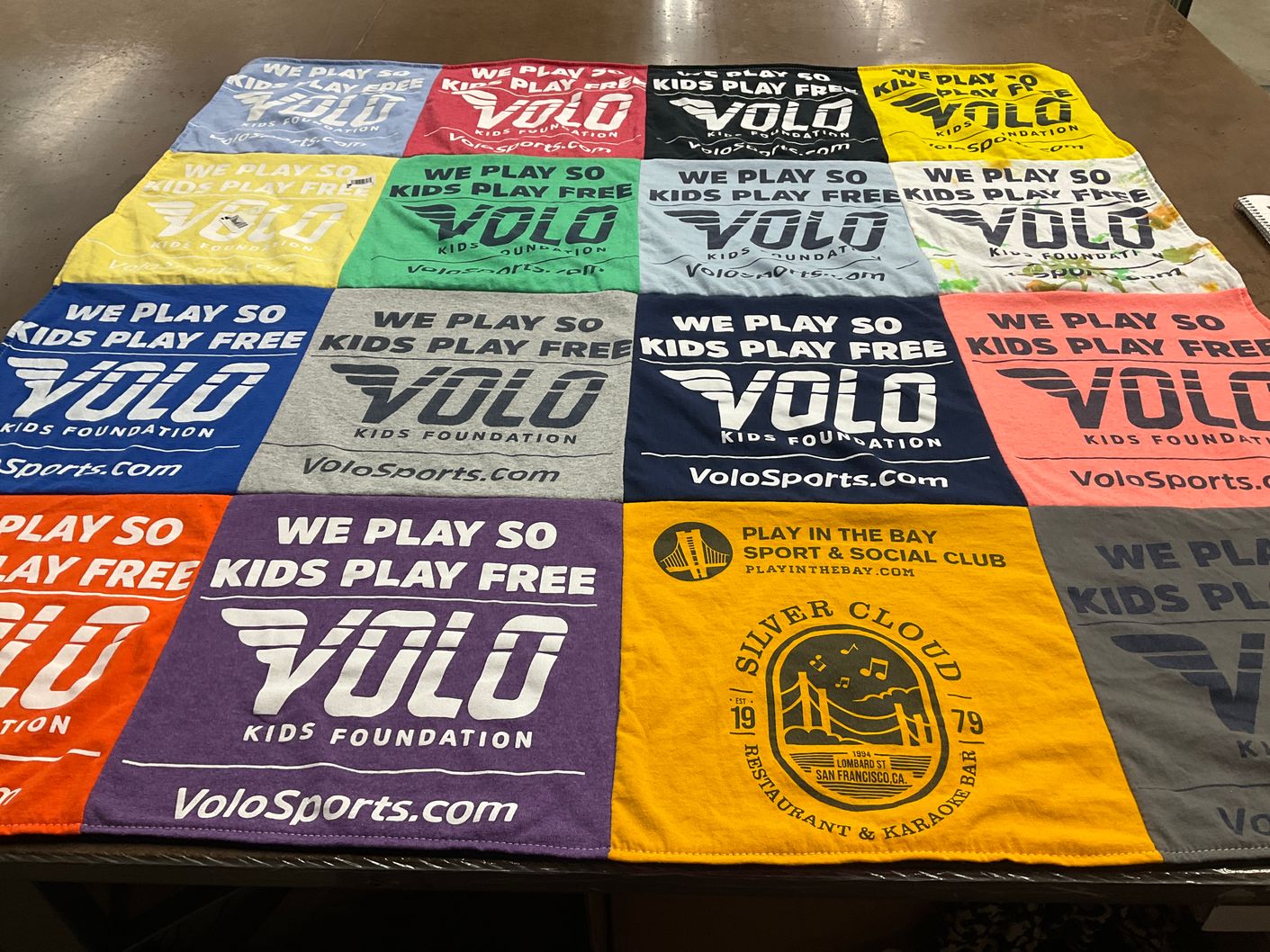 T-shirt quilt with youth sports, charity themes by Mike from CA