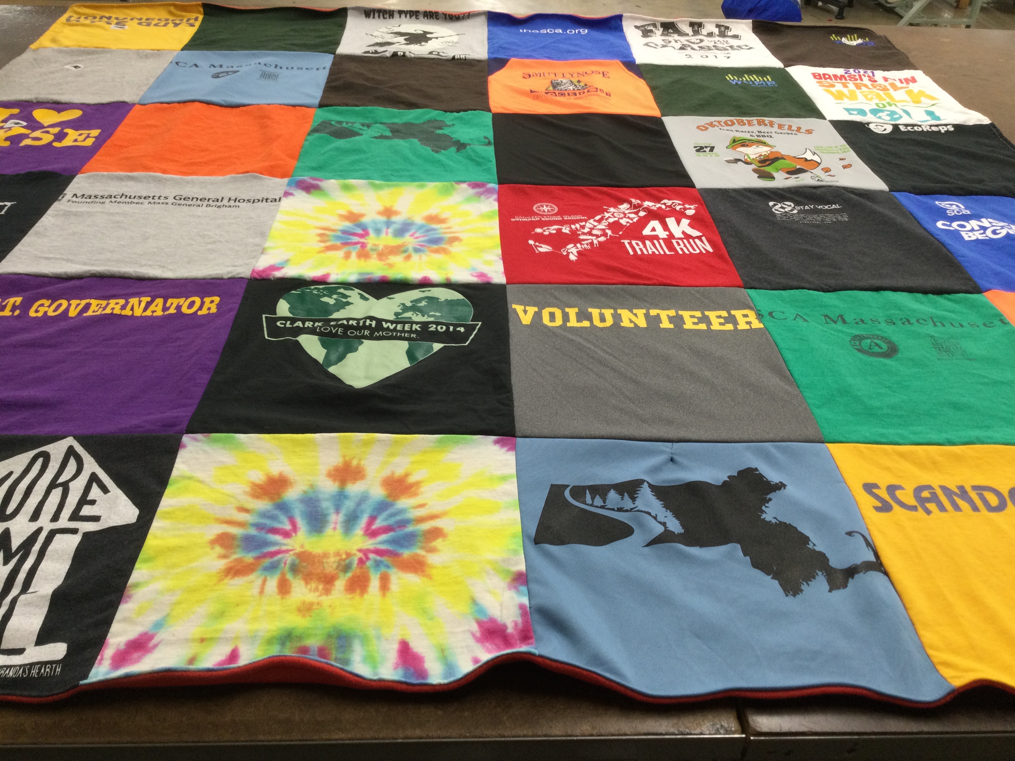 T-shirt quilt with volunteering, environmental awareness themes by Robin from MA