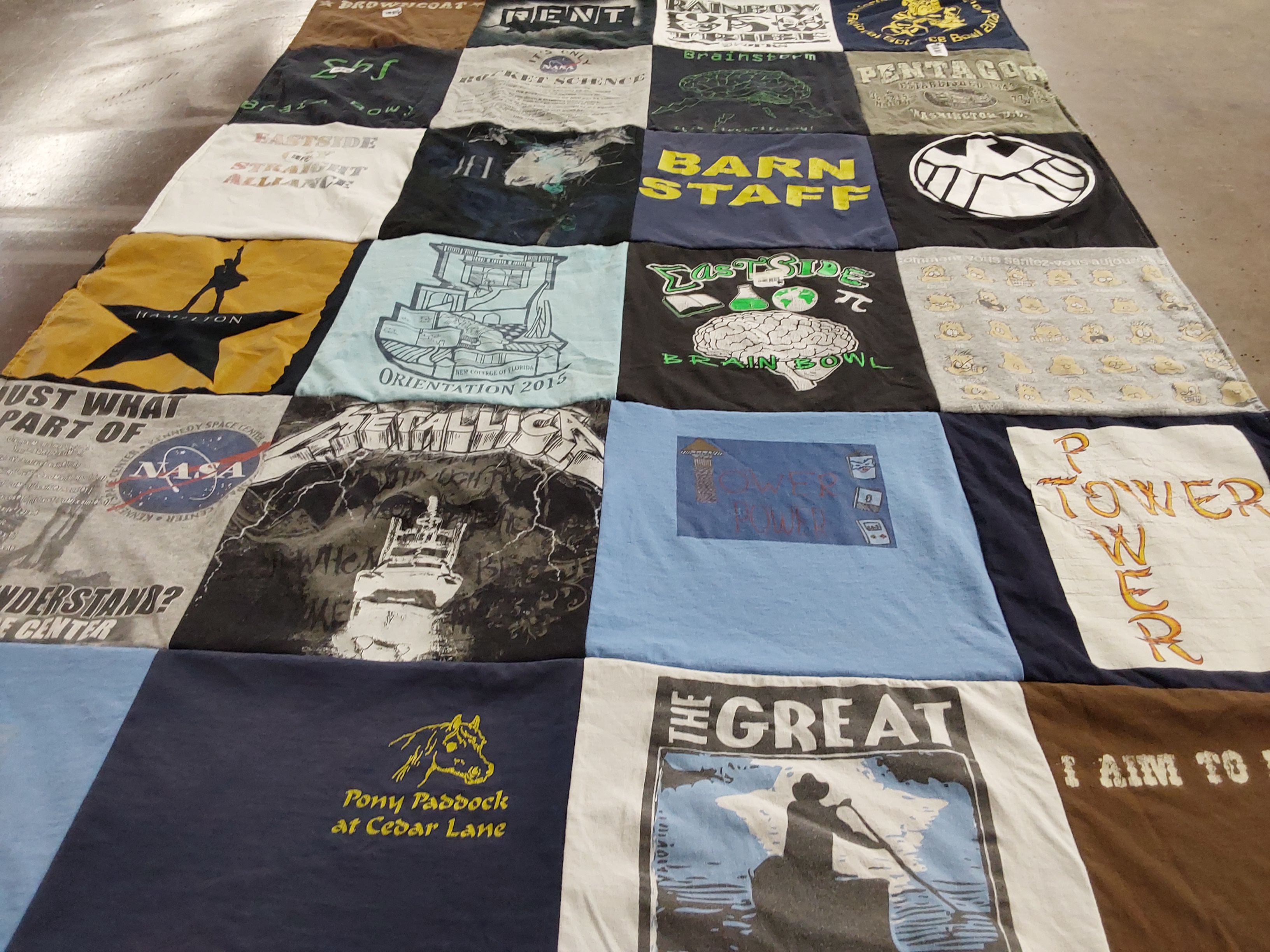 T-shirt quilt with music, science themes by Lisa from NY