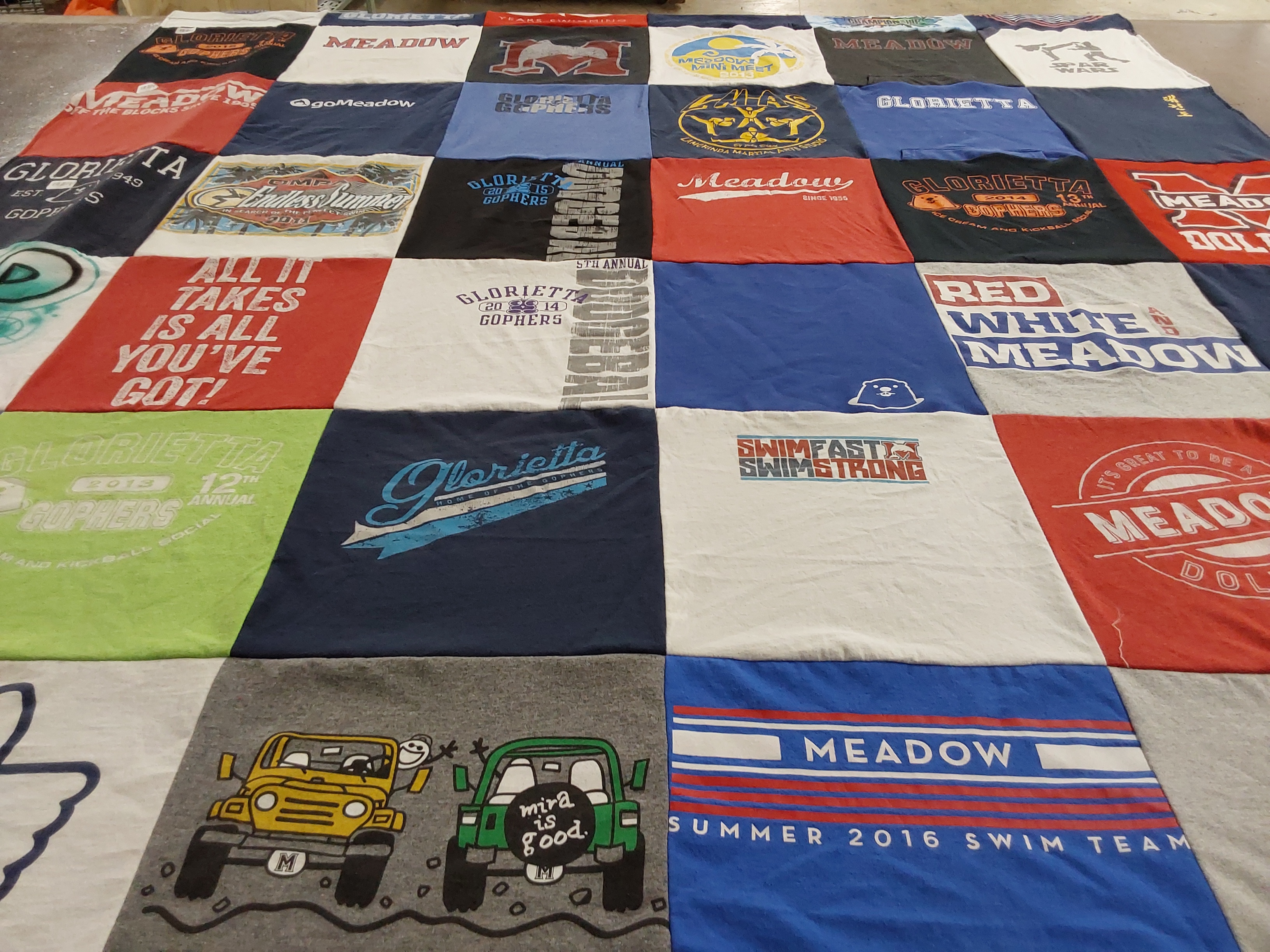 T-shirt quilt featuring meadow swim team by Mia from CA