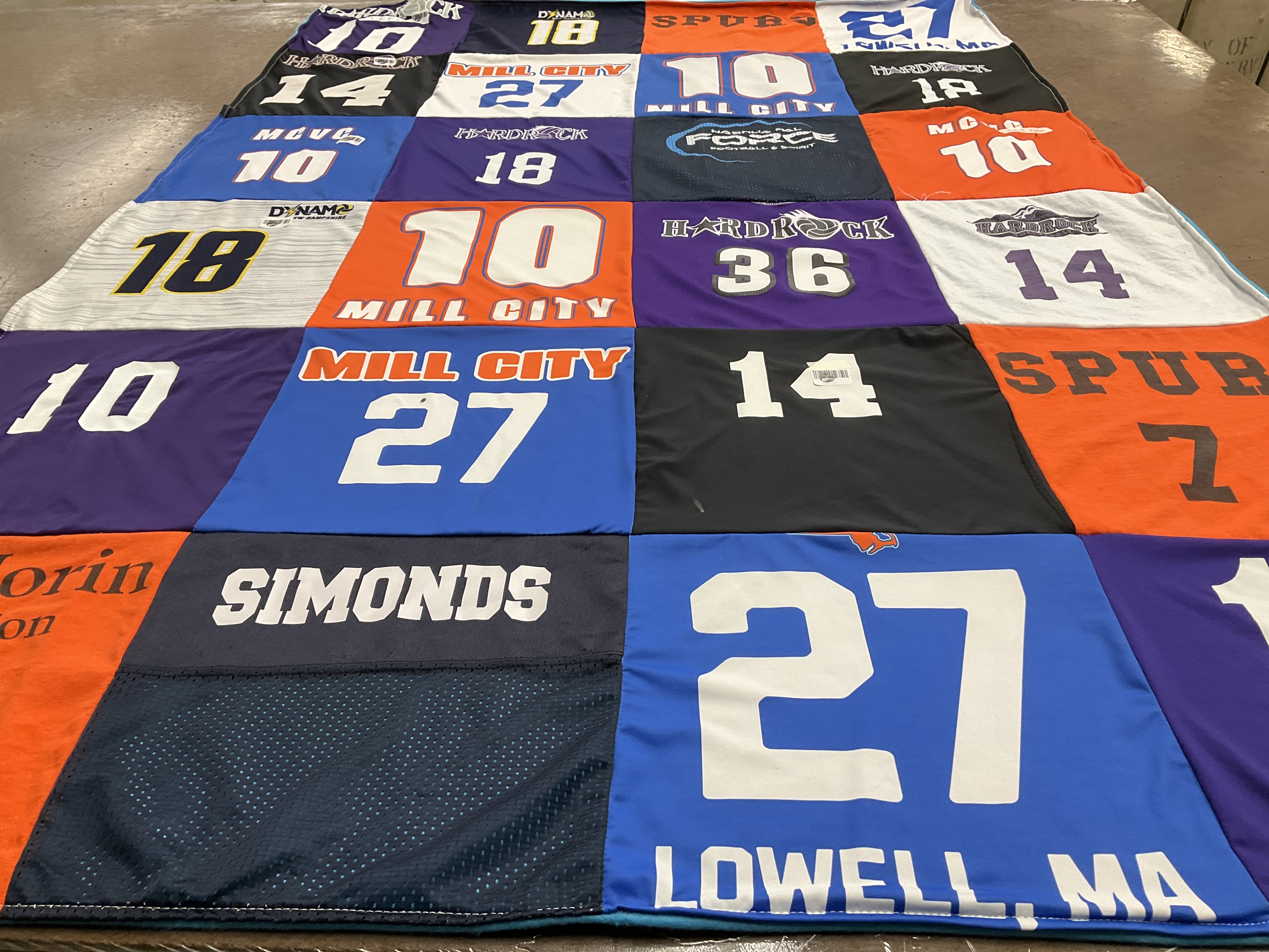 T-shirt quilt with sports, community themes by Todd from NH