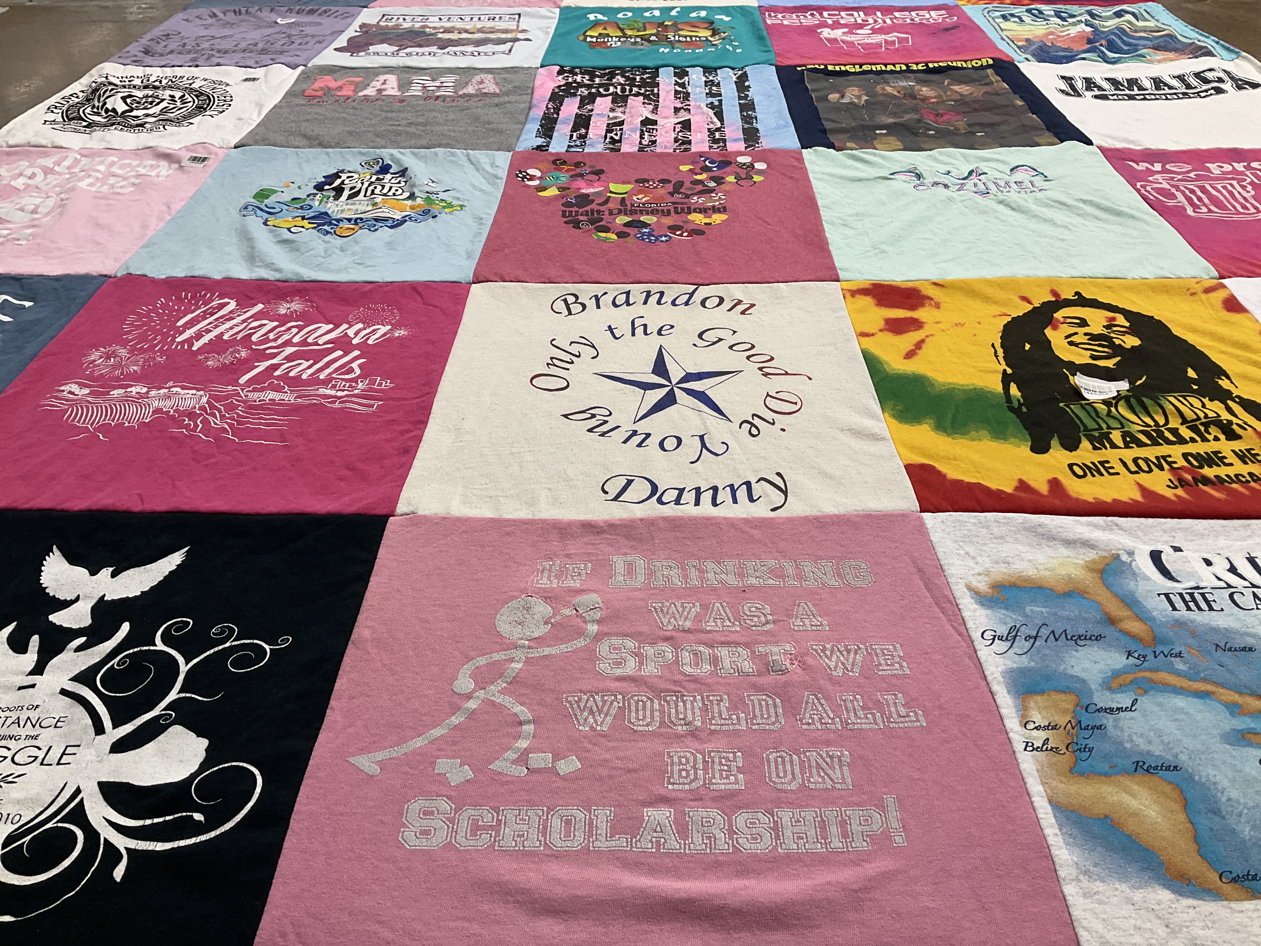 T-shirt quilt with travel, music themes by Jennifer from TN