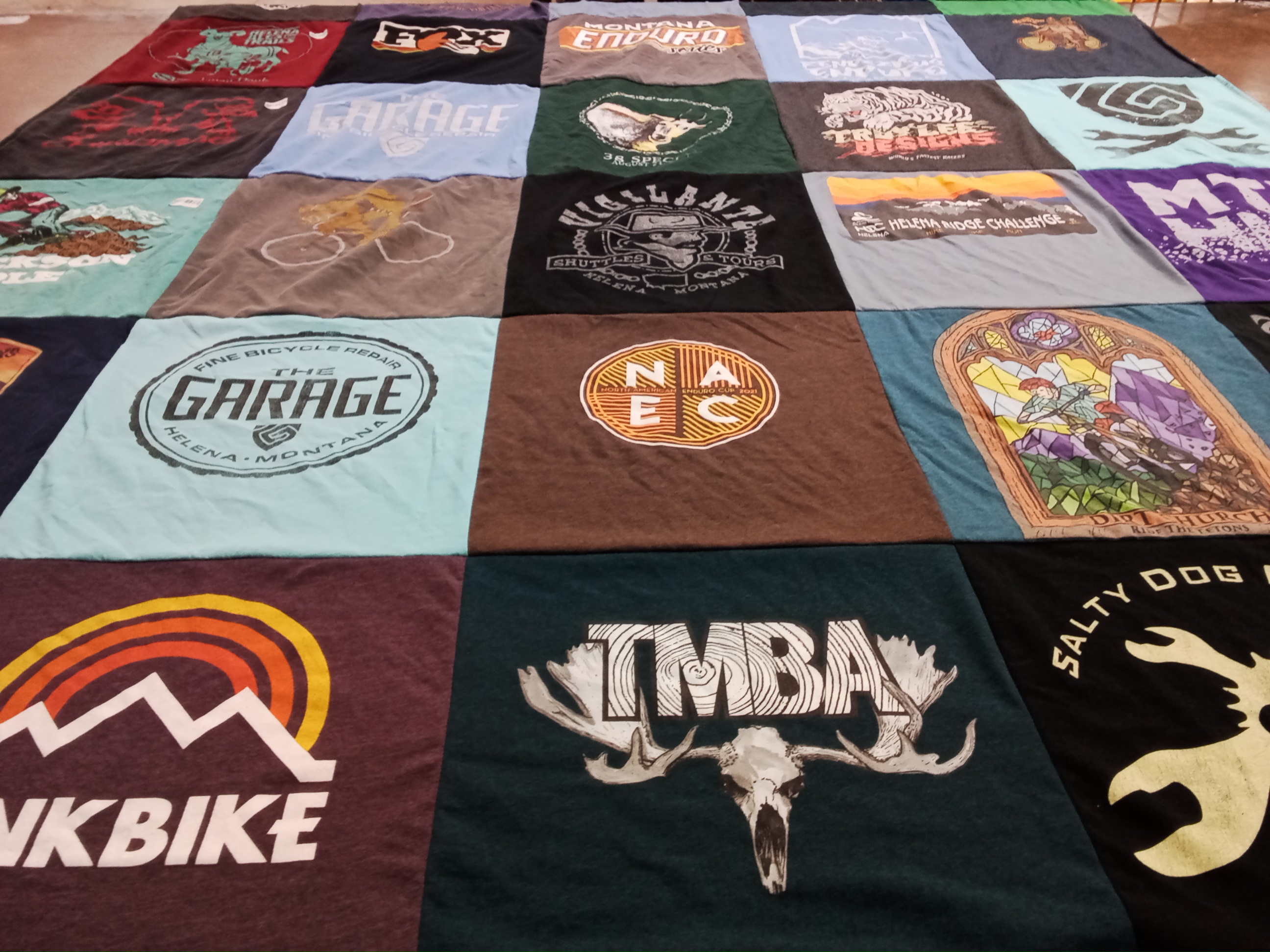 T-shirt quilt with biking, mountain biking themes by Shannon from MT