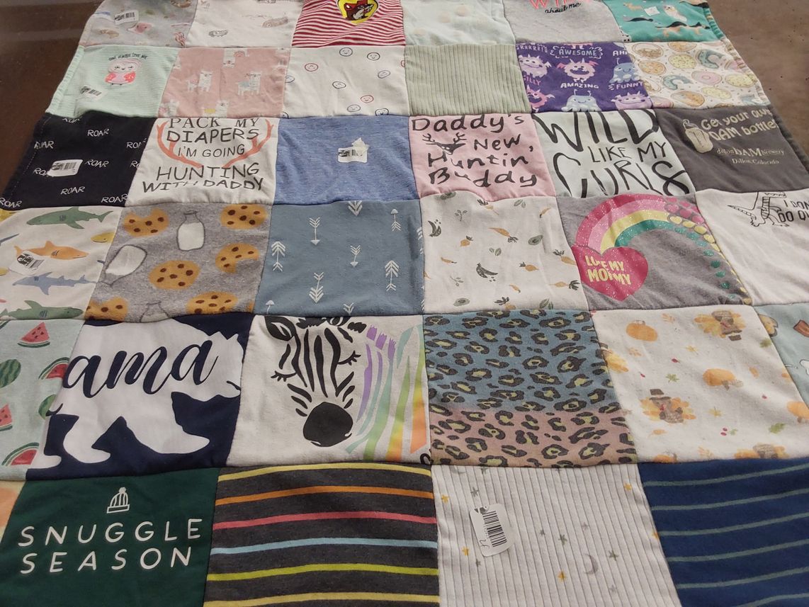 T-shirt quilt with family, hunting themes by Jessie from SD