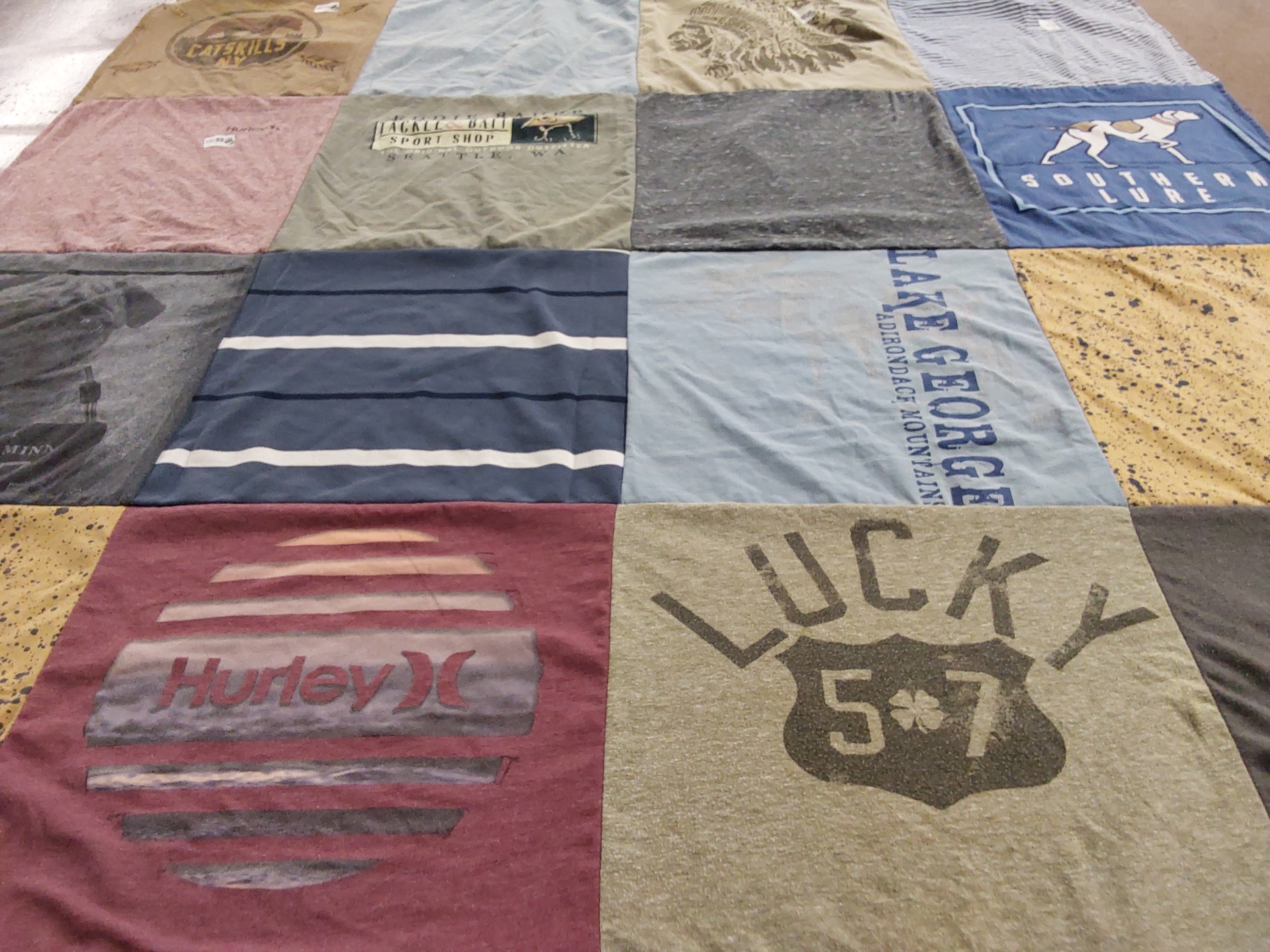 T-shirt quilt with outdoors, hiking themes by Iwona from NY