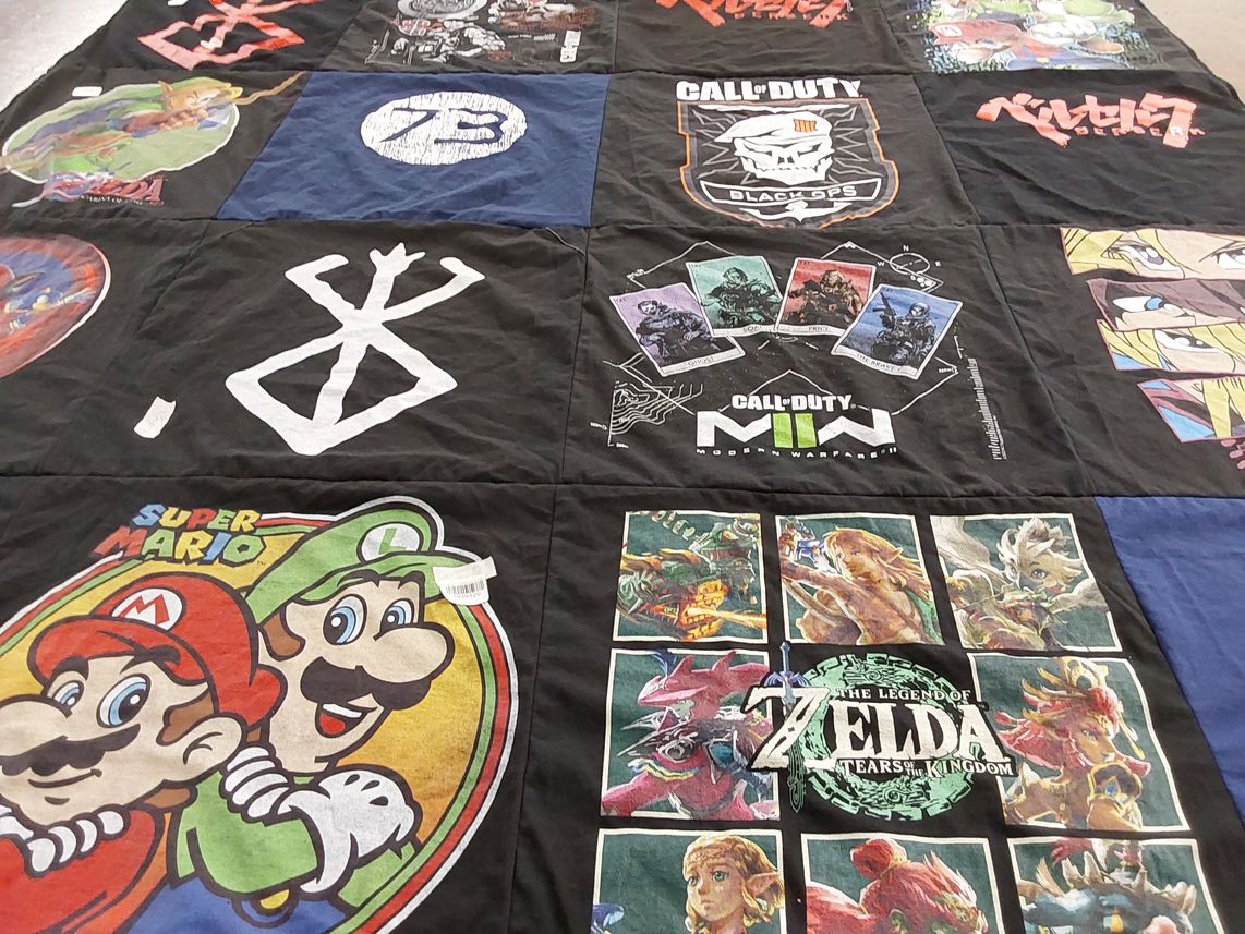 T-shirt quilt with video games, gaming themes by Geri from CA