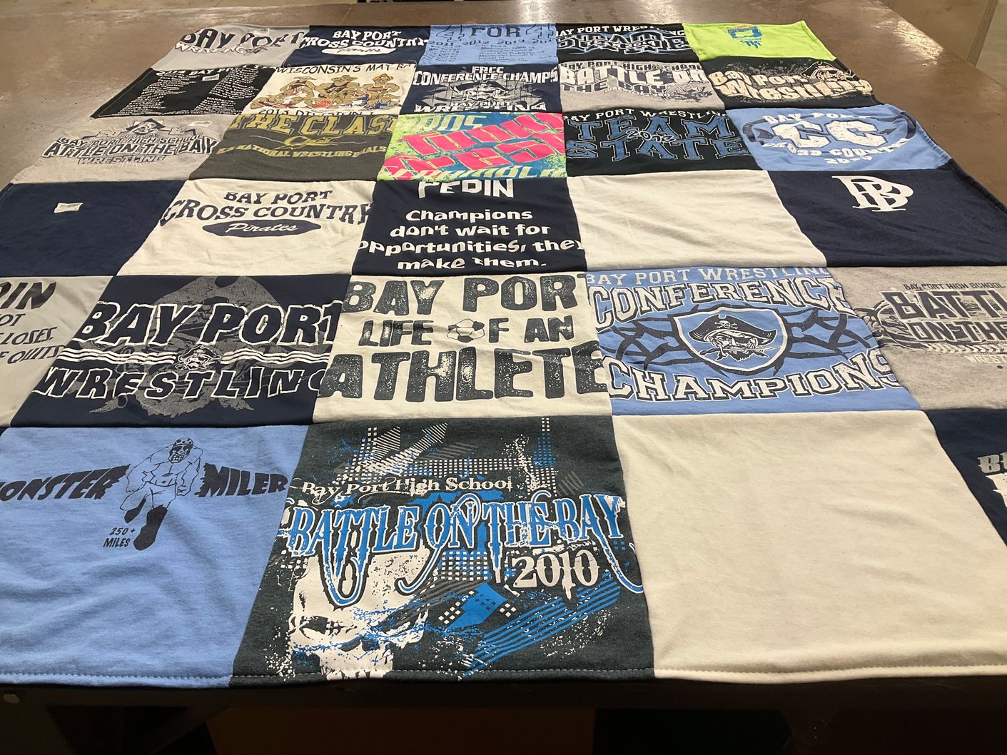 T-shirt quilt featuring bay port wrestling, bay port cross country by Jennifer from WI