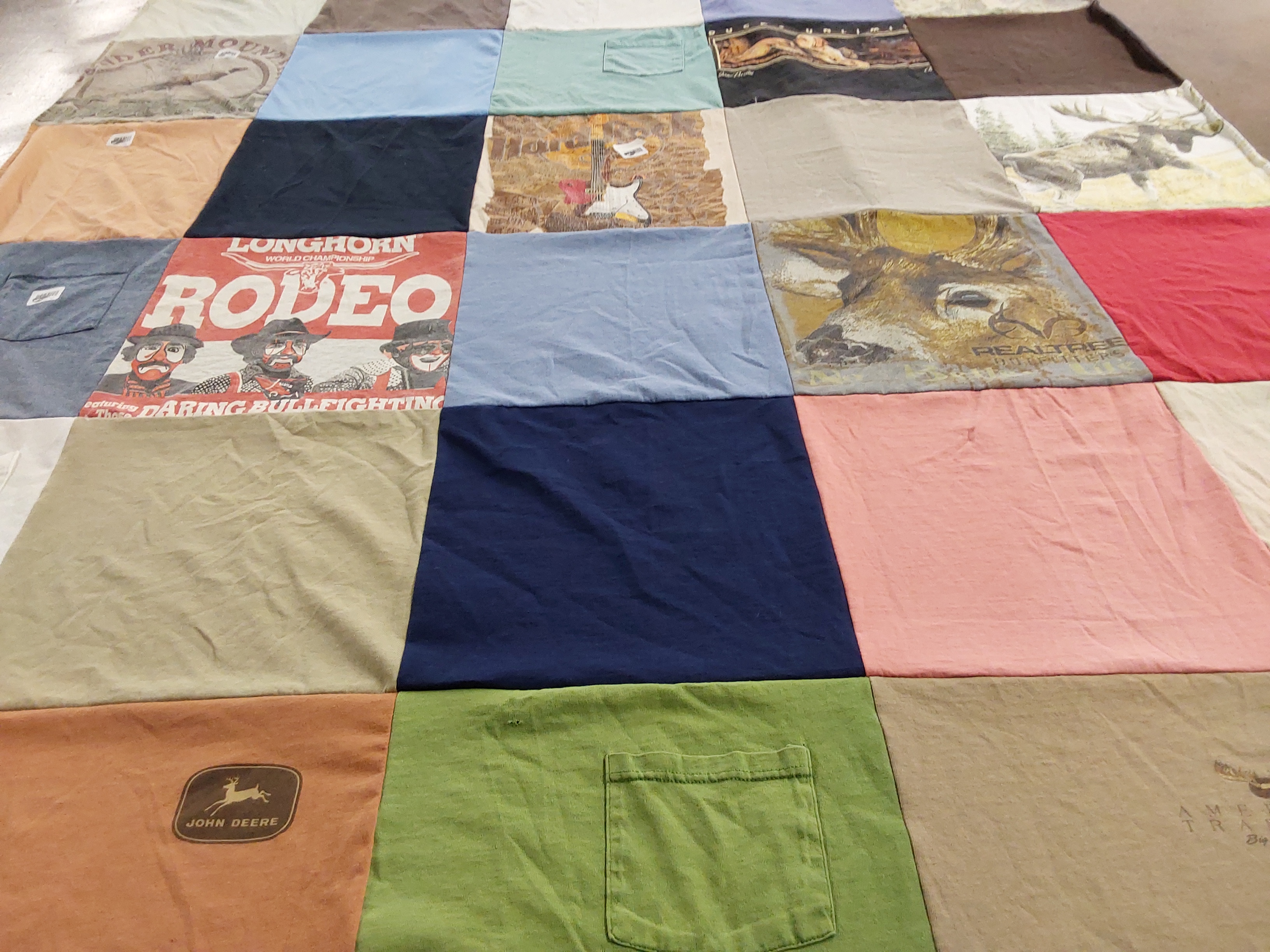 T-shirt quilt with rodeo, hunting themes by Meagan from GA