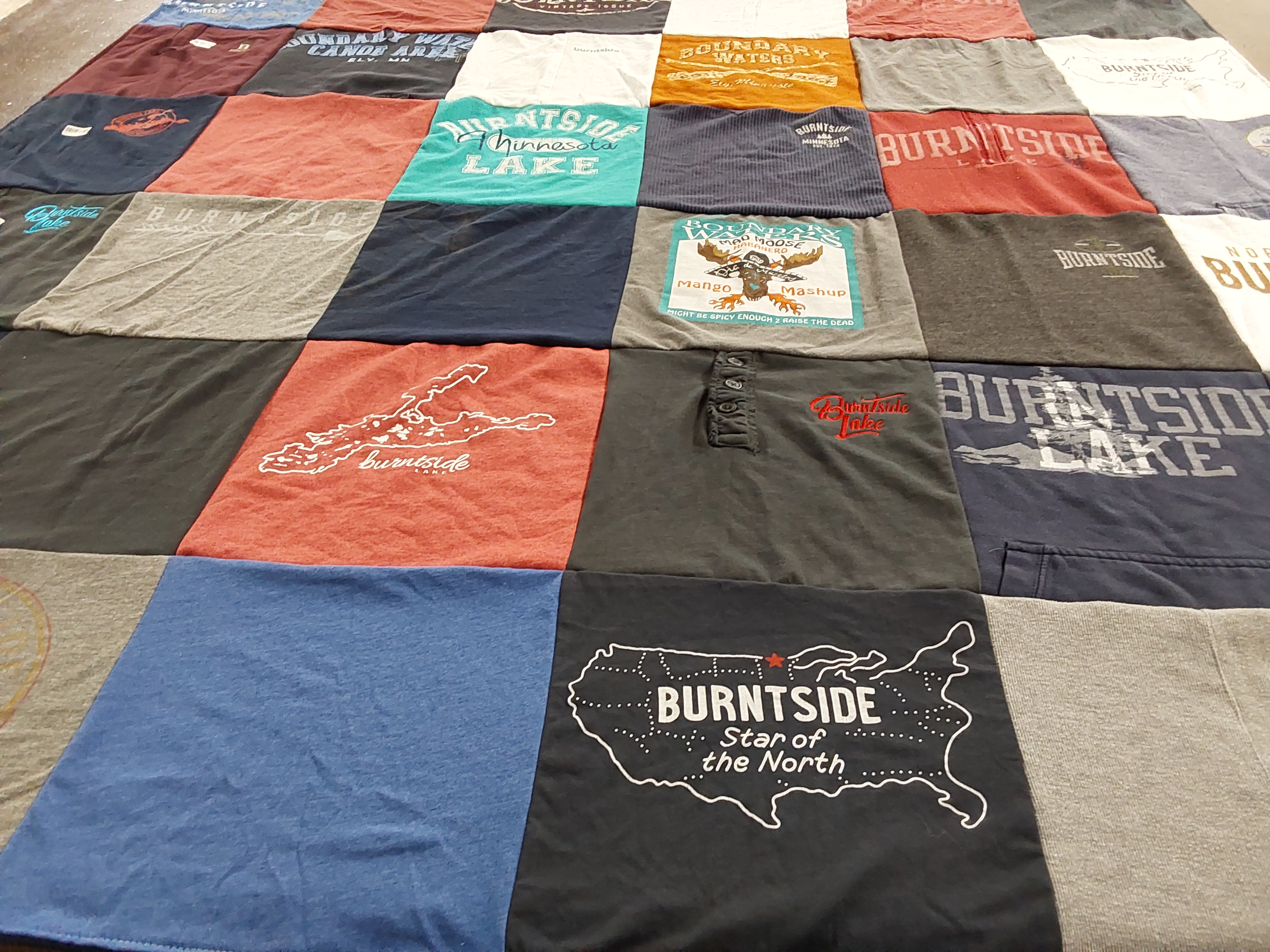 T-shirt quilt with outdoors, fishing themes by Betsy from IA
