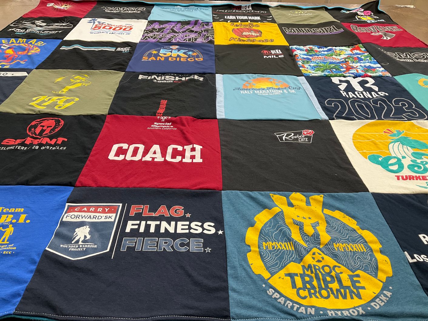 T-shirt quilt with fitness, running themes by Kaitlin from CA