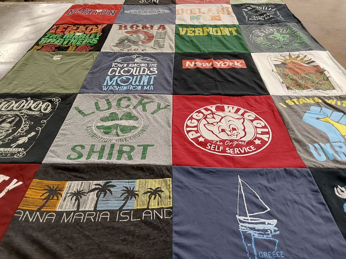 T-shirt quilt with travel, local culture themes by Audrey from MA