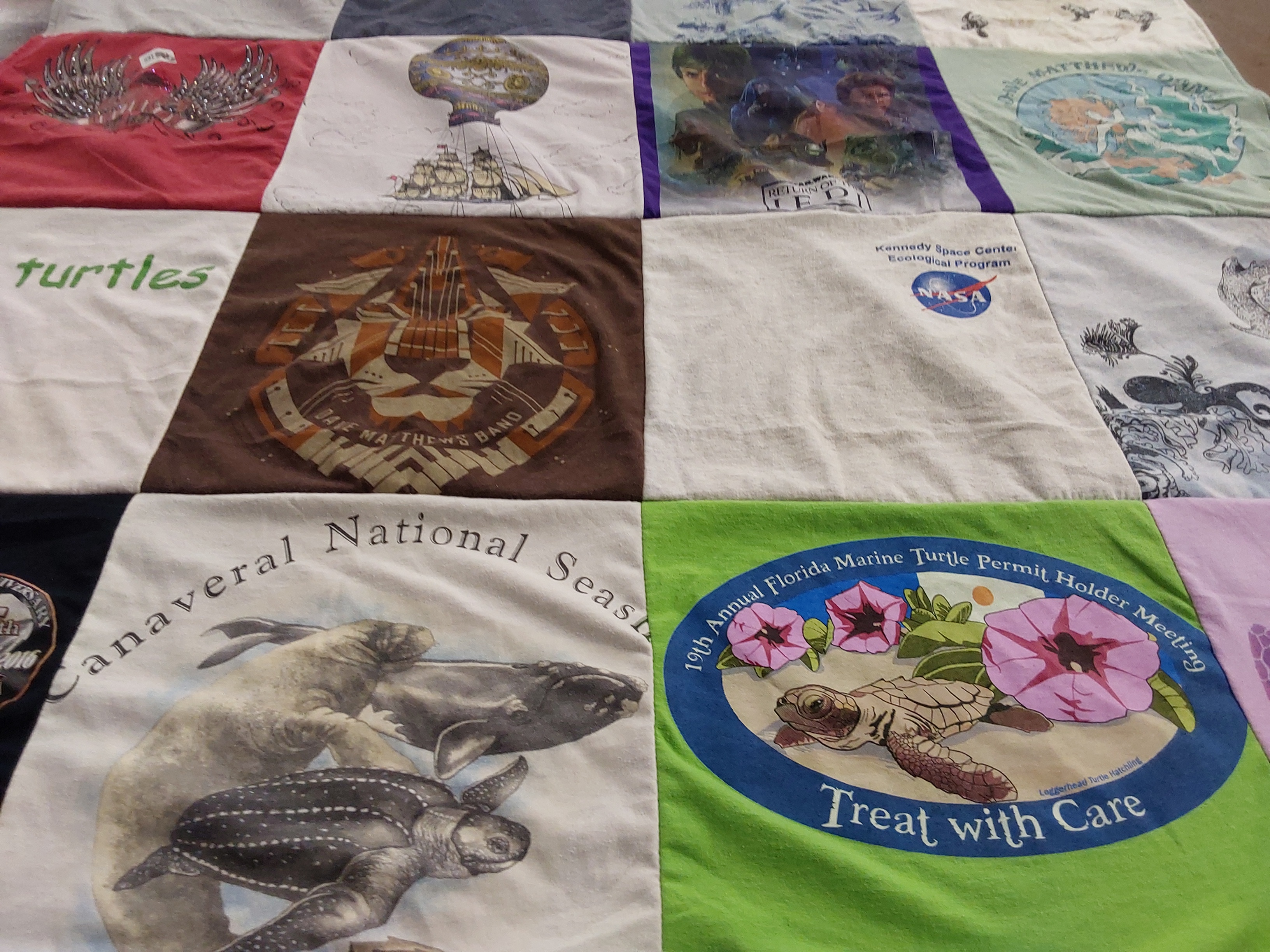 T-shirt quilt with marine life, turtle conservation themes by Lisa from FL