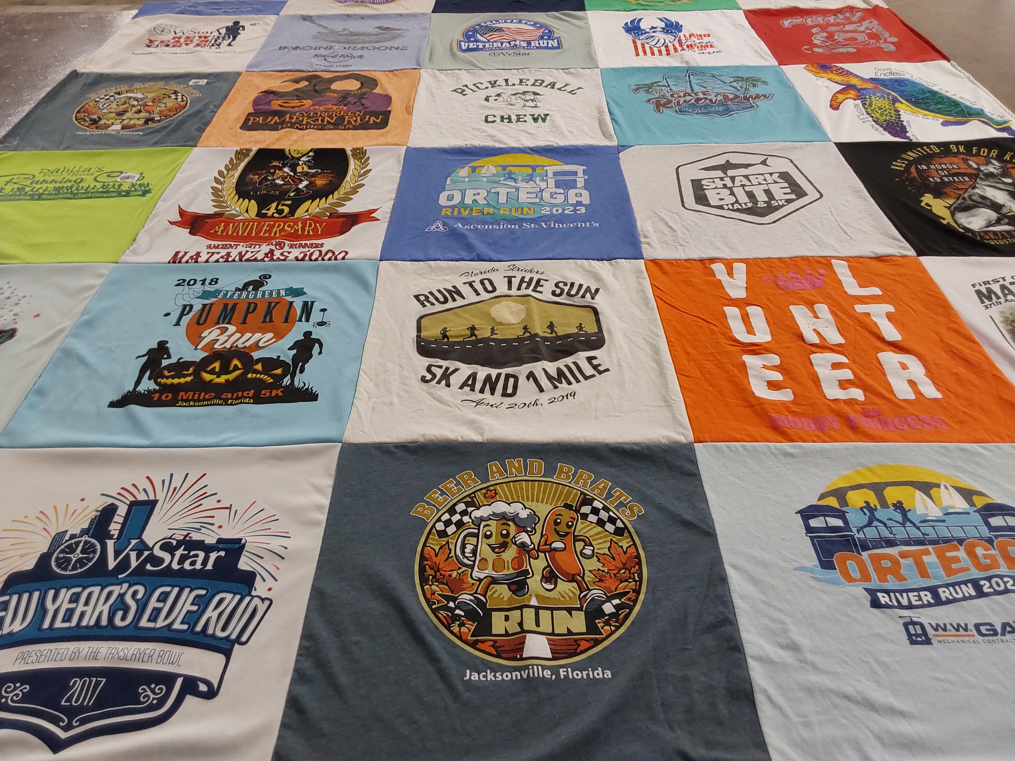 T-shirt quilt with running, events themes by Annette from FL
